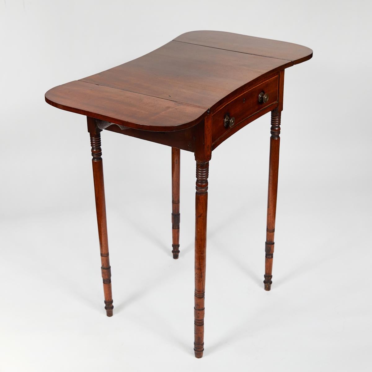 19th century Pembroke drop-leaf mahogany table with single drawer. Table extends to 31 1/4