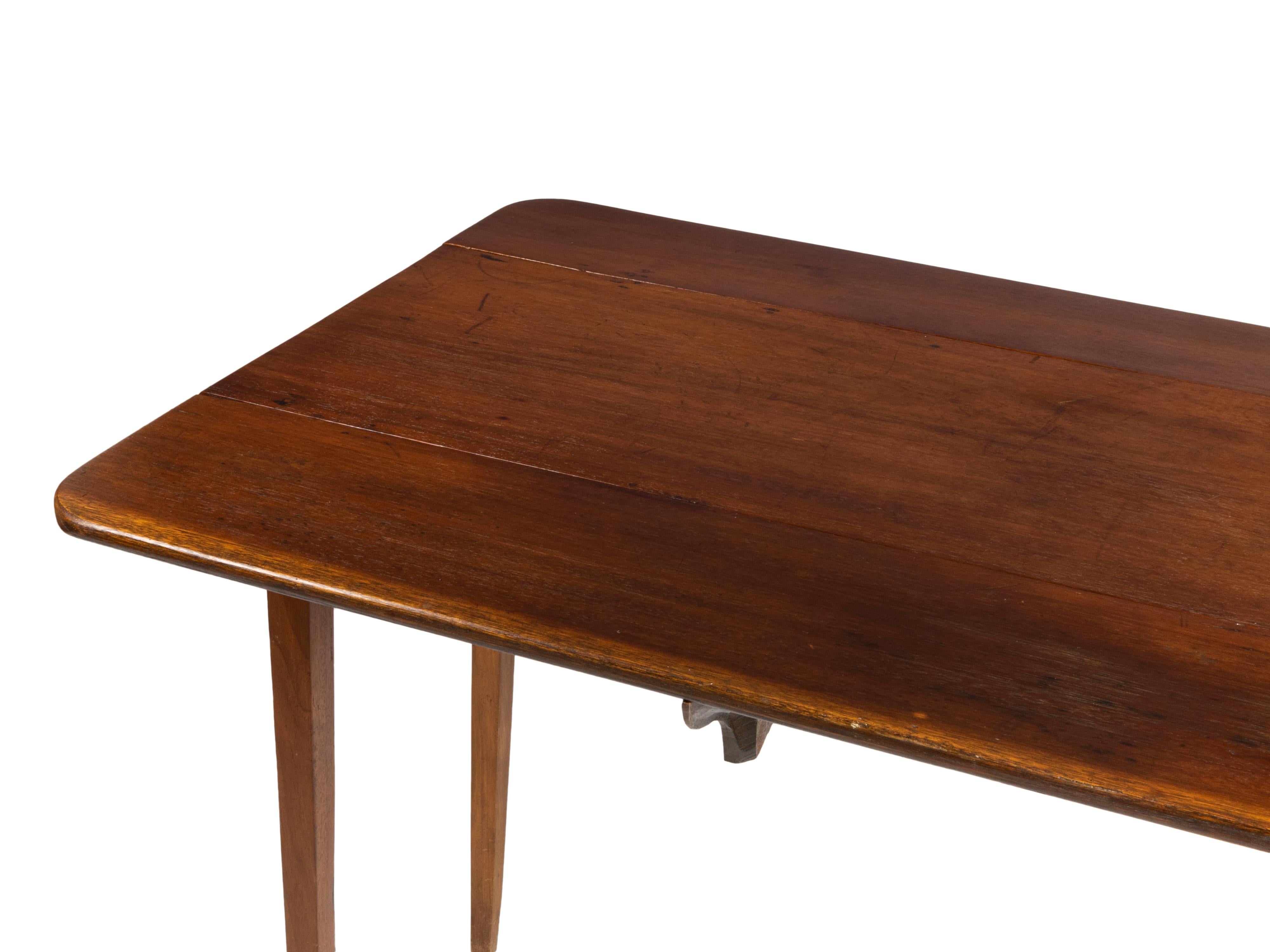 A Pembroke Flap Table, in various woods with one drawer, an elegant portuguese 19th century work. 

Height 75.7 cm 87.2 x 41.8 cm Each flap: 19.7