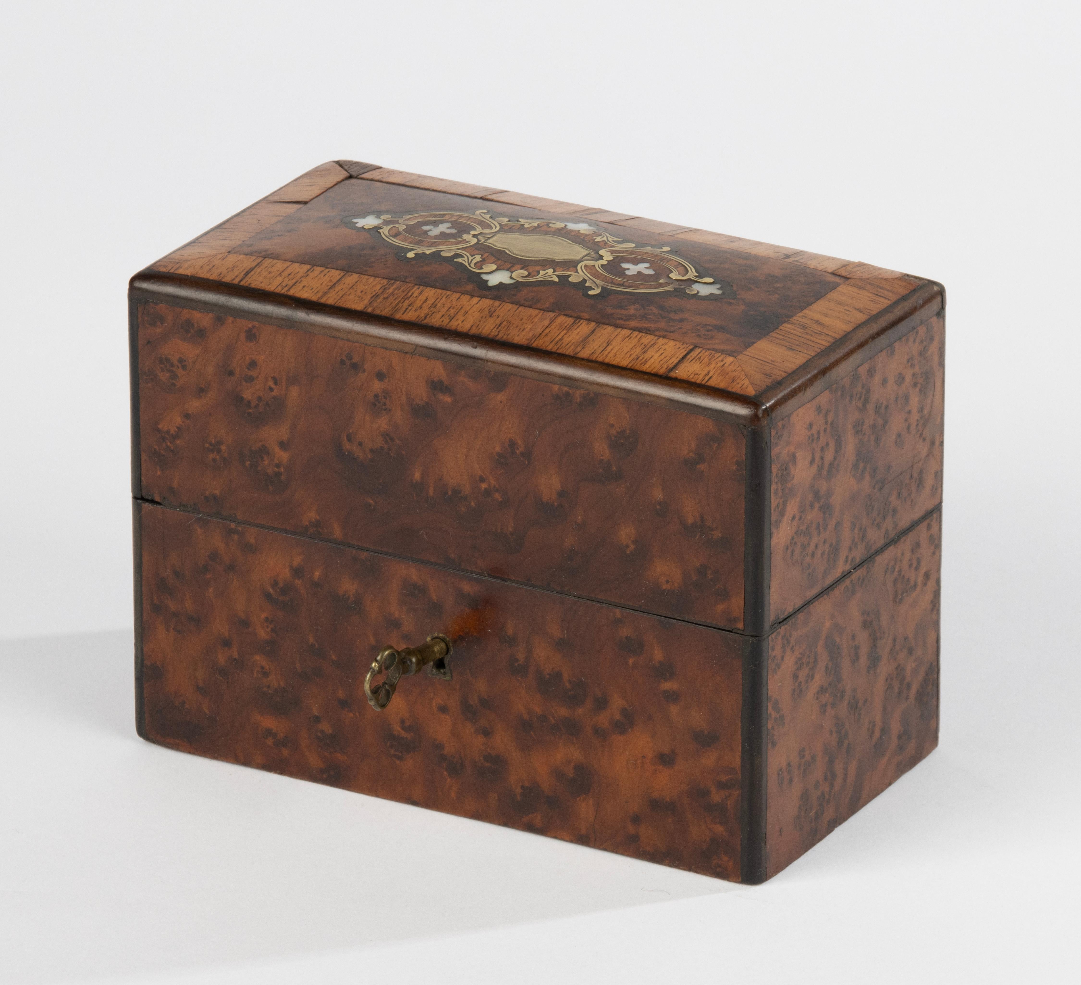 A beautiful antique marquetry wooden box for perfume.
The box dates from the French Napoleon III period, circa 1880-1890.
The box features those original crystal perfume bottles, beautifully decorated with gold-colored accents.
The whole is in good