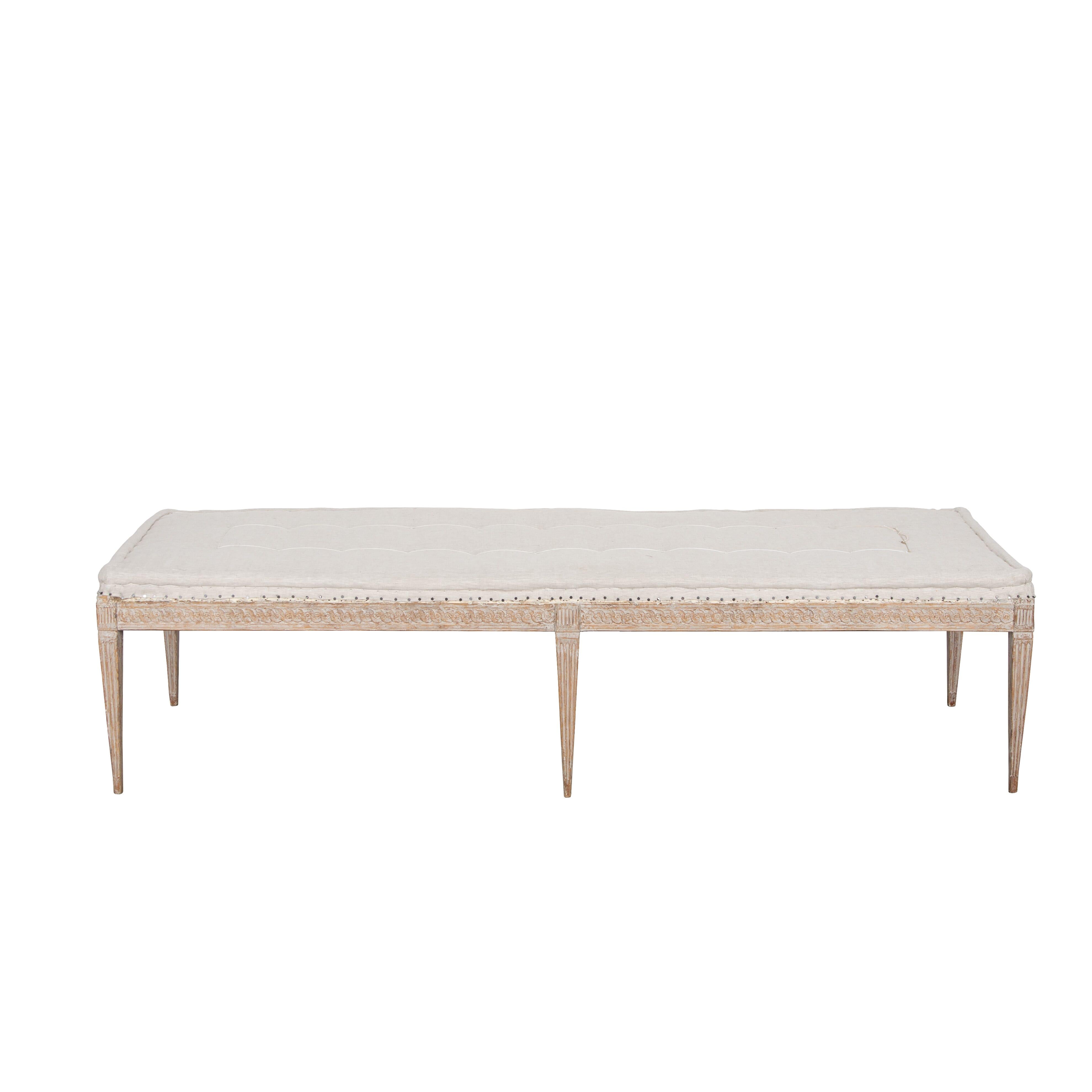 19th century period Gustavian bench.
With decorative carved detailing to the front stretcher and reeded design to the legs. Repainted in soft grey and newly upholstered in linen.
circa 1860.