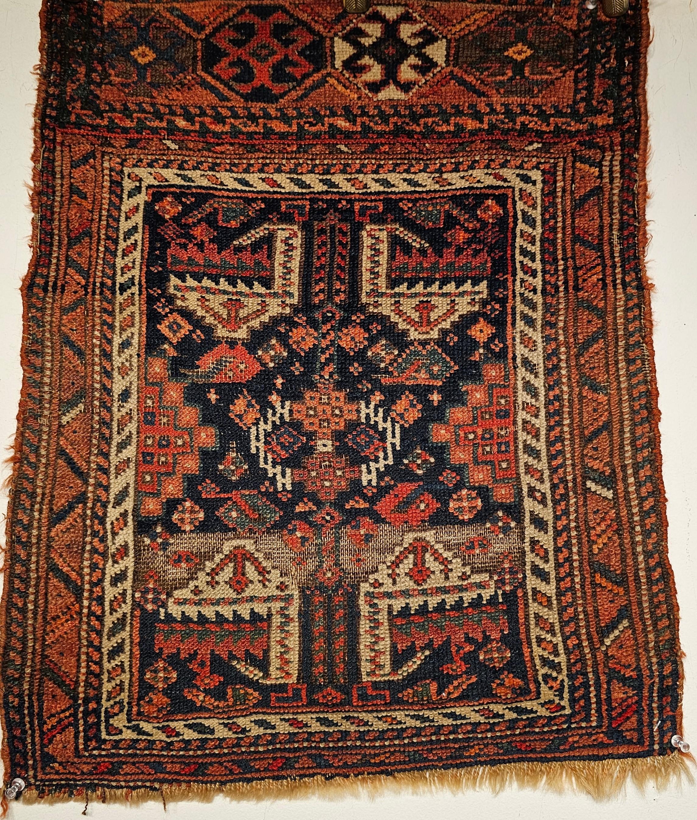 19th century Persian Afshar Tribal Bagface used as Nomadic People Wall Art. It could have been the face of a saddlebag. The bag face and mafrash items started their lives as utilitarian items for the use by the village and tribal weavers and more