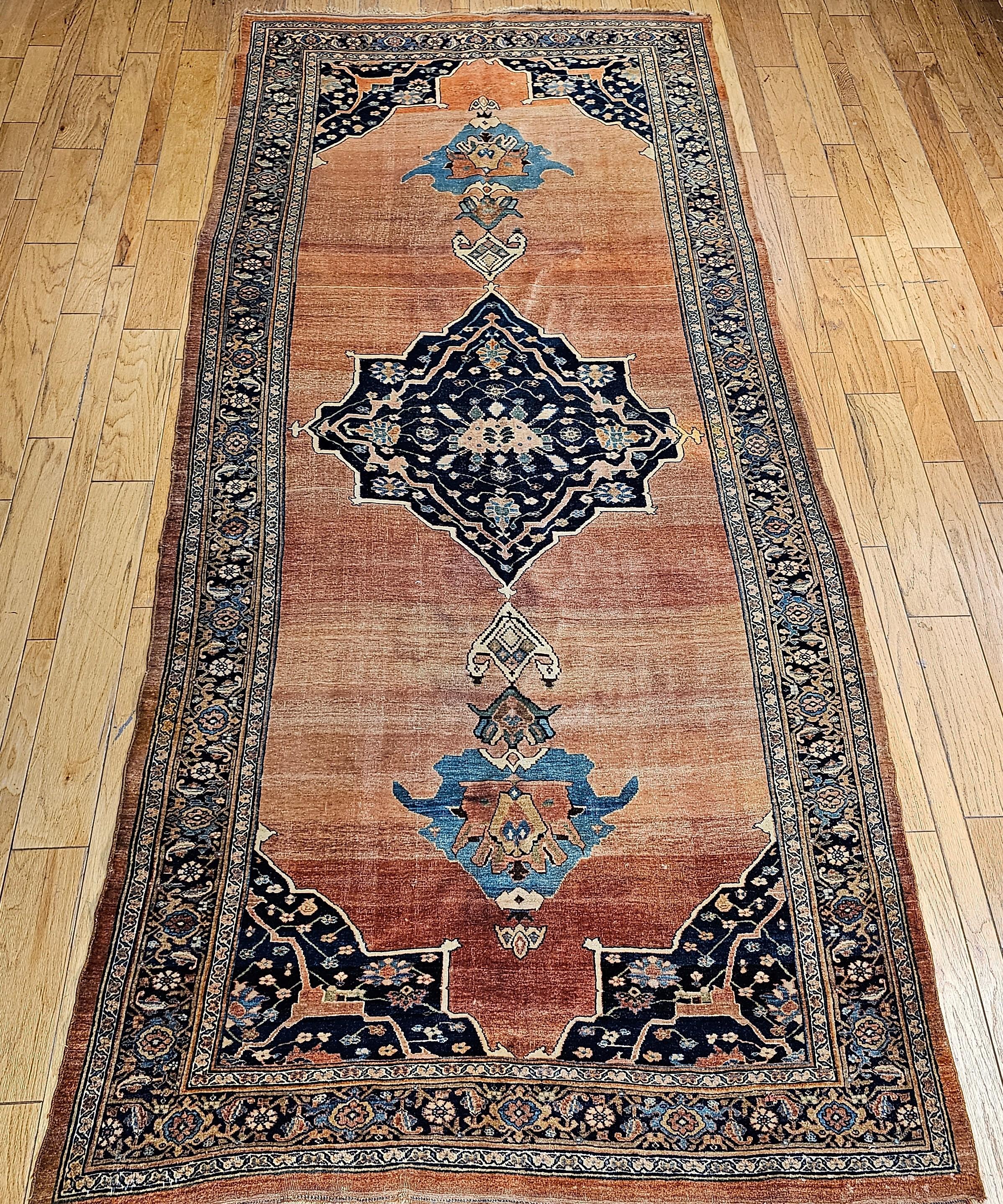 This Bidjar (Bijar) gallery (corridor) rug is a great example of the art of Persian rug weaving from the last quarter of the 1800s. The Bidjar (Bijar) rug is a very unique and extremely desirable abrash rust color open field design. The border is in