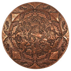 19th century Persian Empire copper charger decorated with engraved repousse work