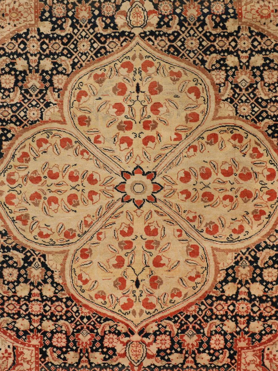 This 19th century Persian Haji Jalili Tabriz carpet consists of a hand-knotted woolen pile, cotton warp and threads, and natural vegetable dyes. Created circa 1880 by master weaver Haji Jalili, one of the foremost artists of his time, it is an