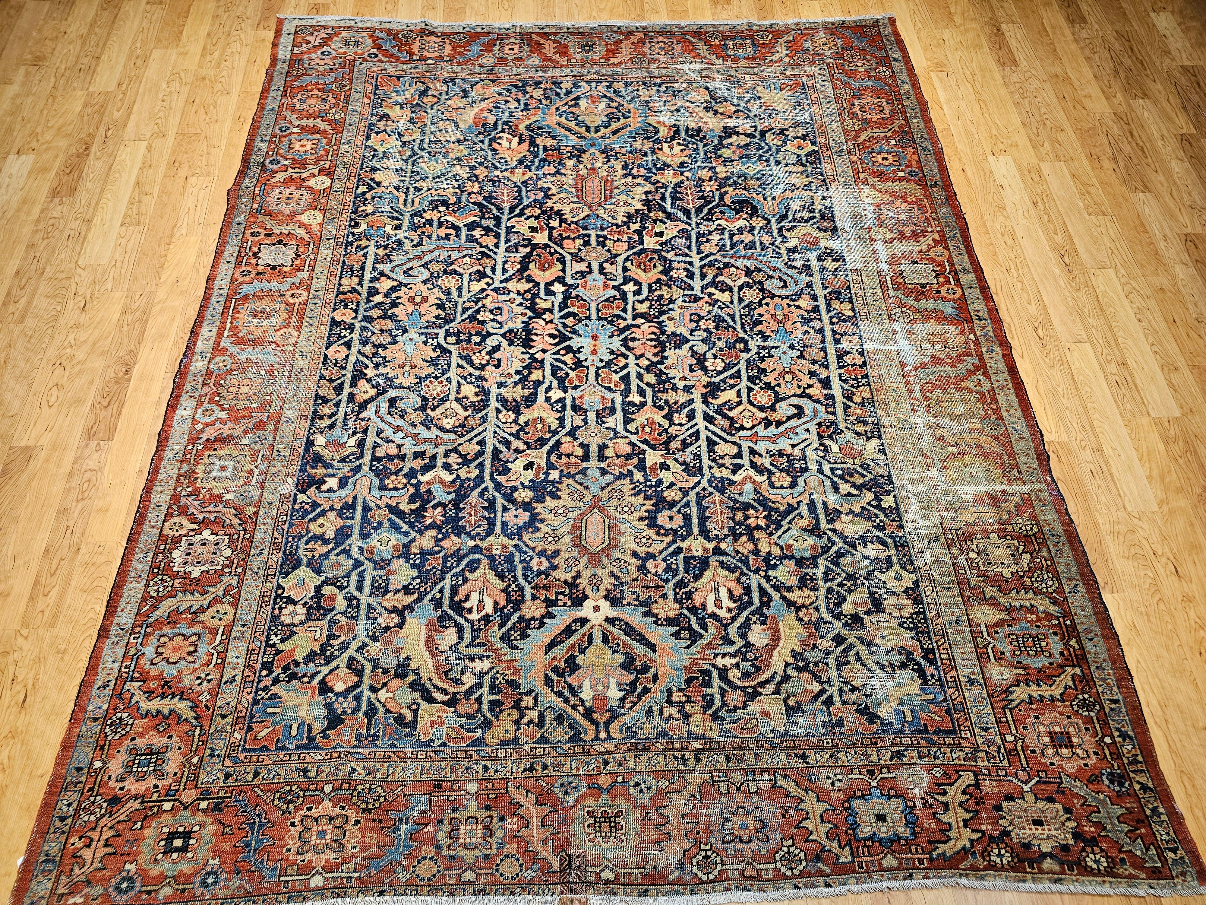 Discover a truly rare masterpiece from Northwest Persia: an exceptional 19th Century Hand-Knotted Persian Heriz Serapi rug, dating from the mid-1800s. This extraordinary room-size carpet features a captivating and seldom-seen all over 
