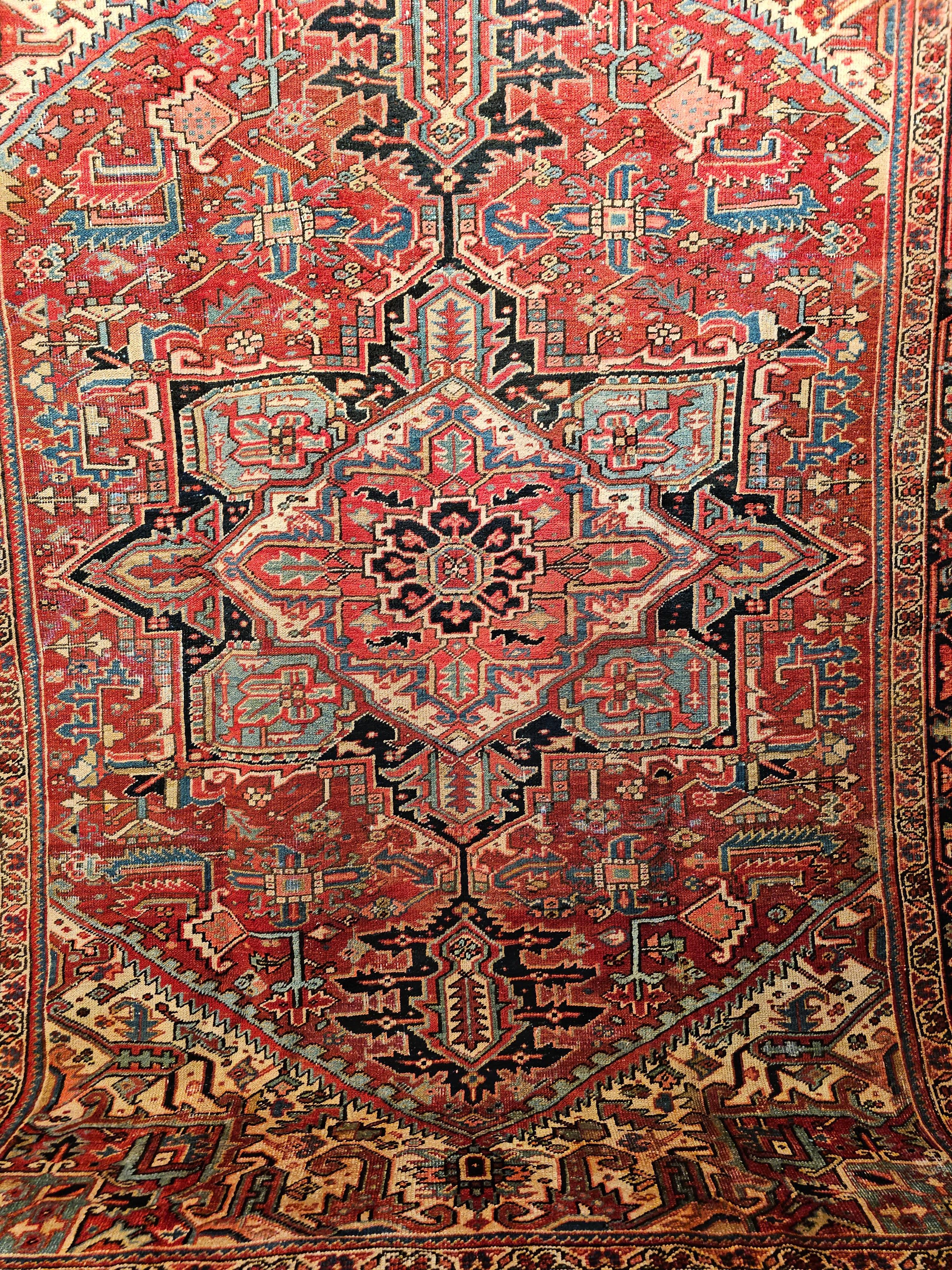 Hand-Knotted 19th Century Persian Heriz Serapi in Red, Turquoise, Green, Yellow, Pink, Navy For Sale
