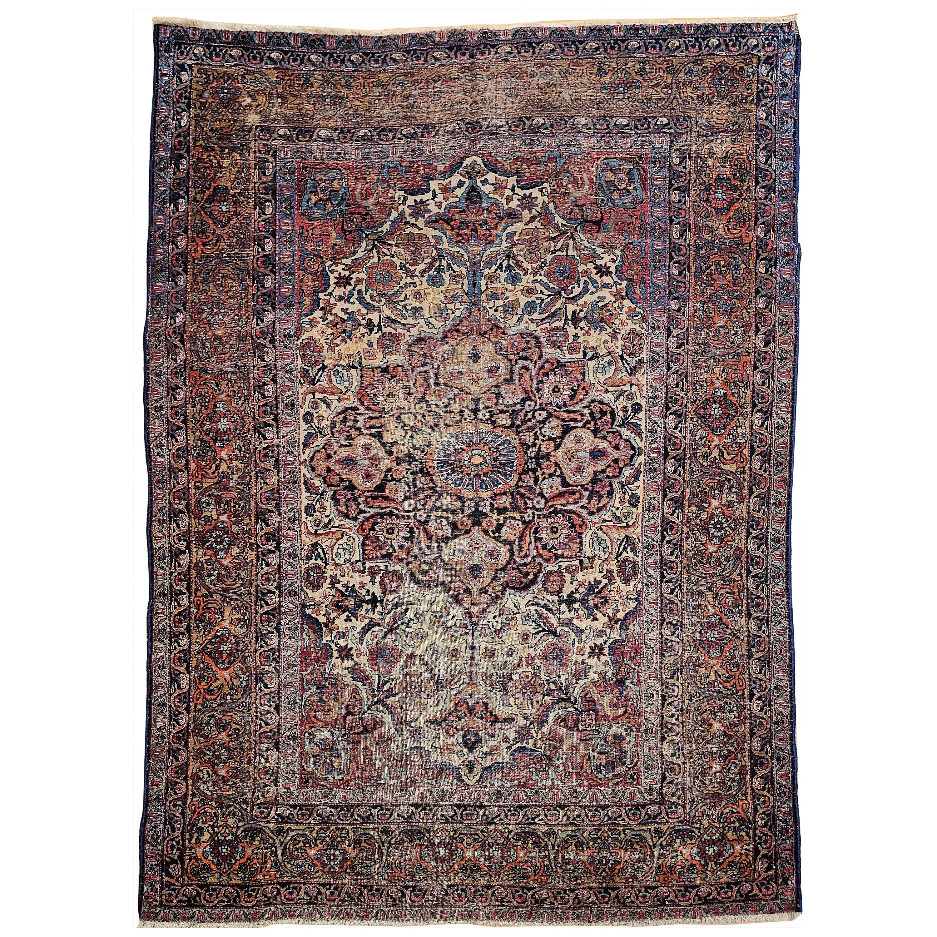 Tapis persan Kashan du 19ème siècle à motif floral en ivoire, bleu marine et safran en vente