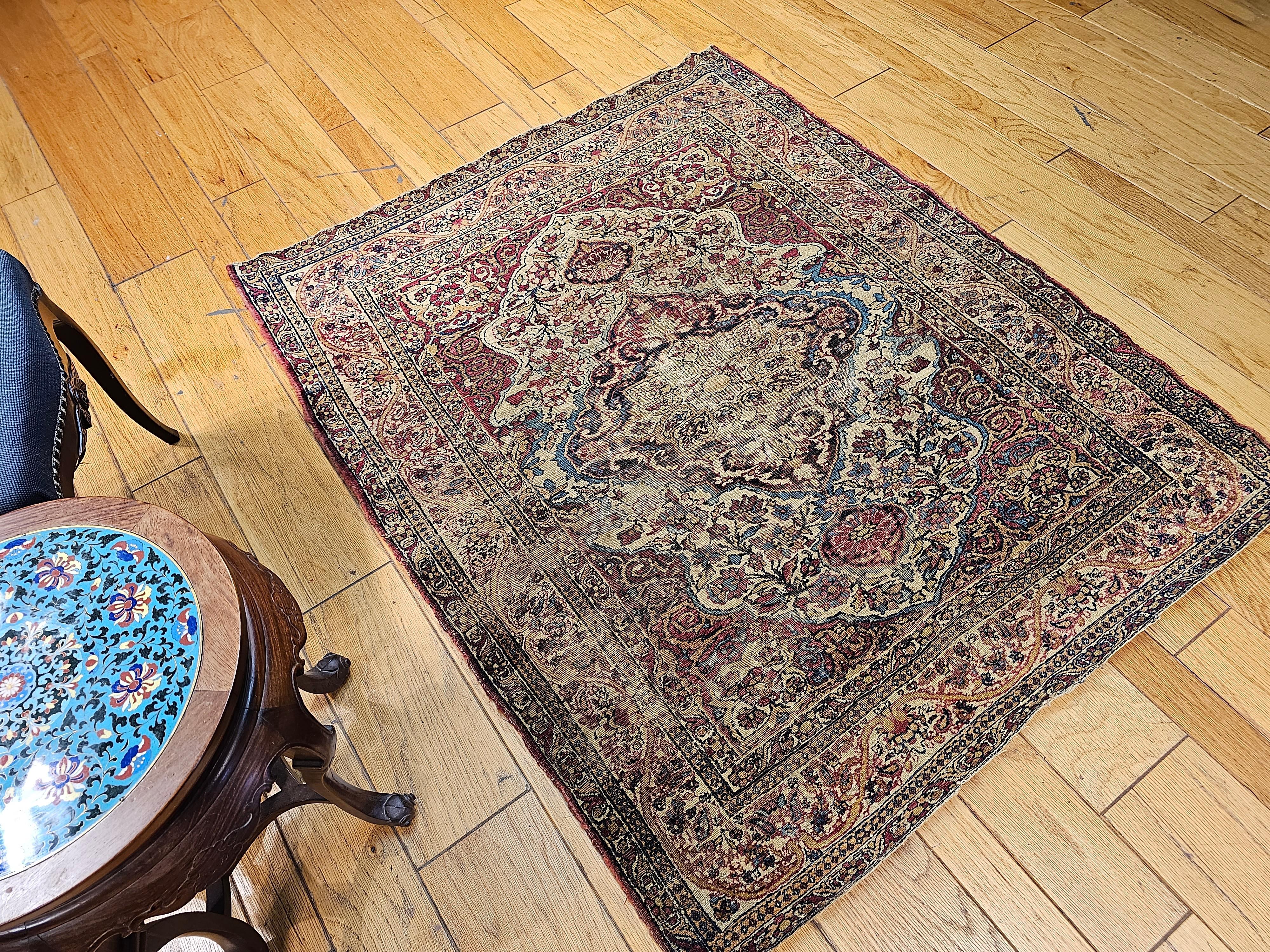 19th-Century Persian Kerman Lavar Area Rug in Floral Design in Ivory, Red, Blue For Sale 12