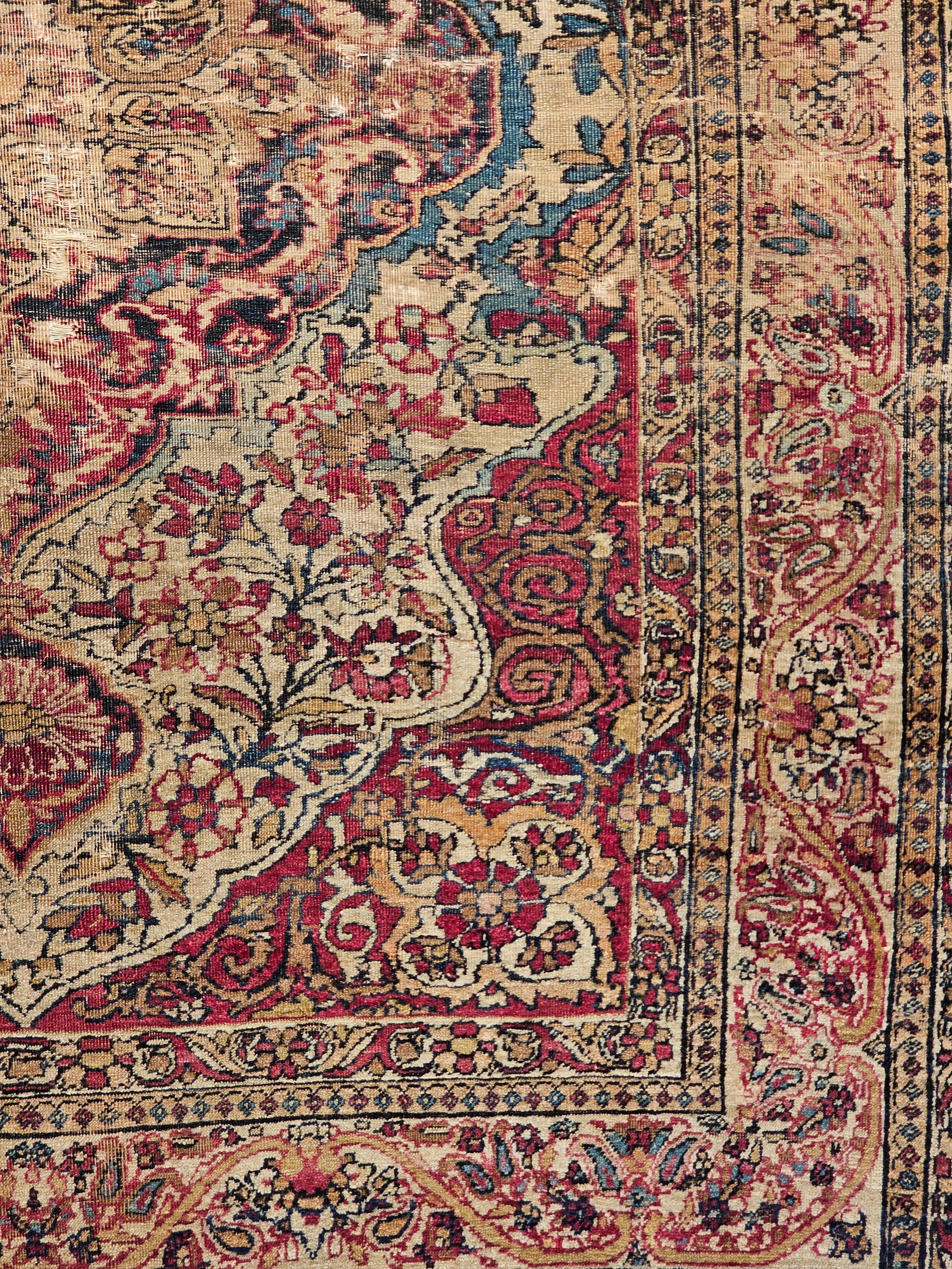Lana Tappeto persiano Kerman Lavar del XIX secolo in avorio, rosso, blu persiano e blu navy in vendita