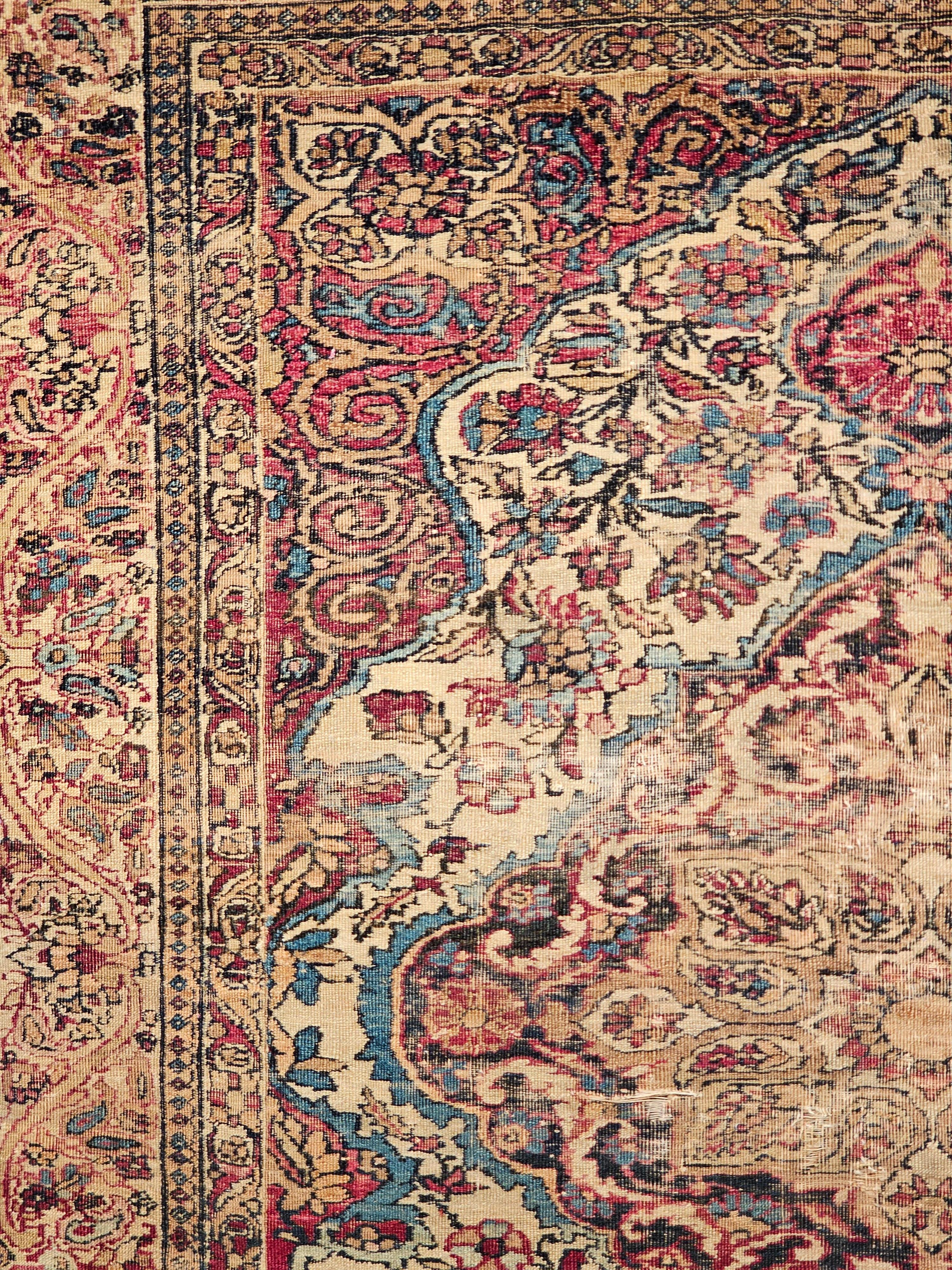 19th-Century Persian Kerman Lavar Area Rug in Floral Design in Ivory, Red, Blue For Sale 1