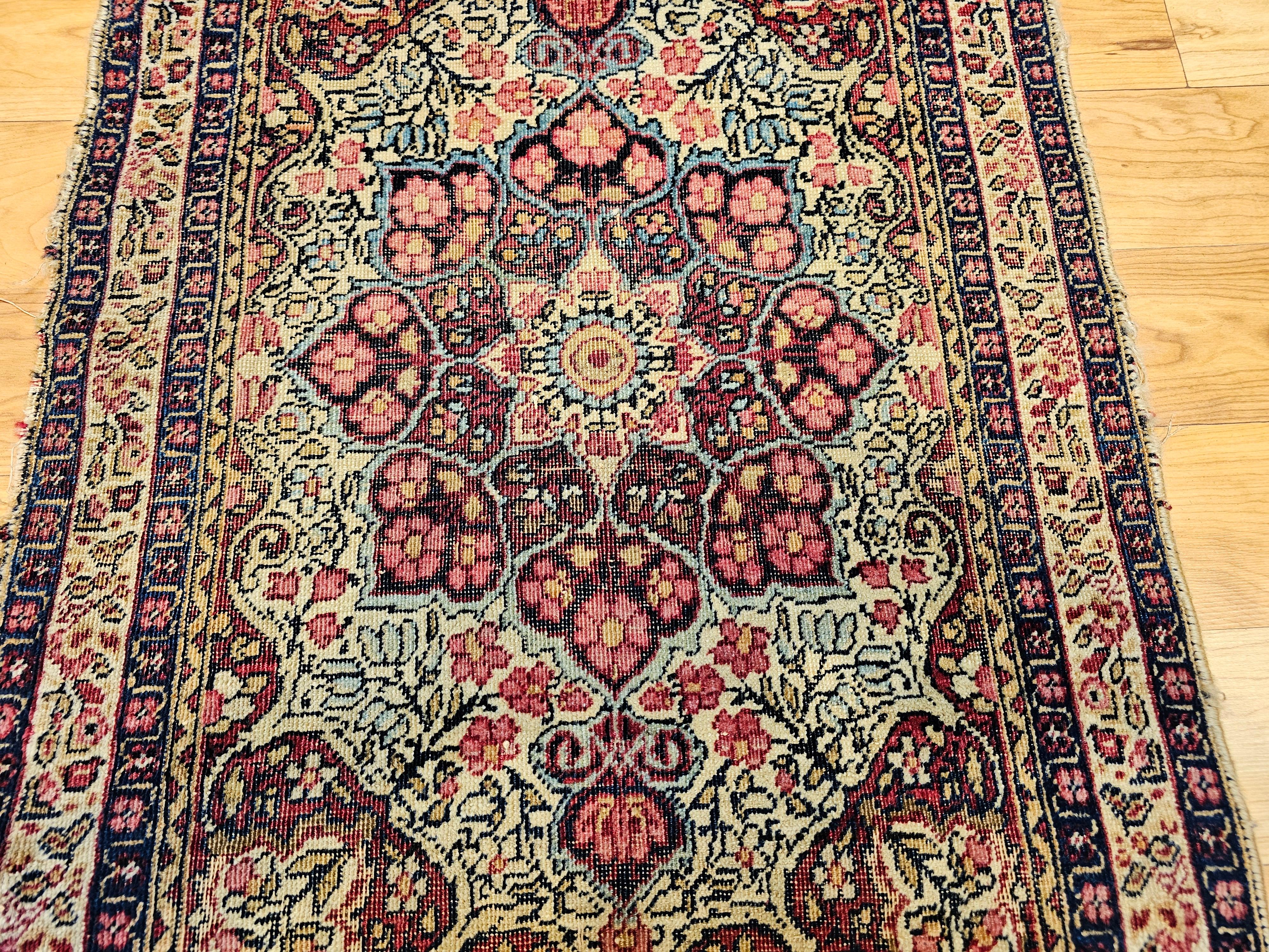 Vegetable Dyed 19th Century Persian Kerman Lavar in Floral Pattern in Ivory, Burgundy, Yellow For Sale