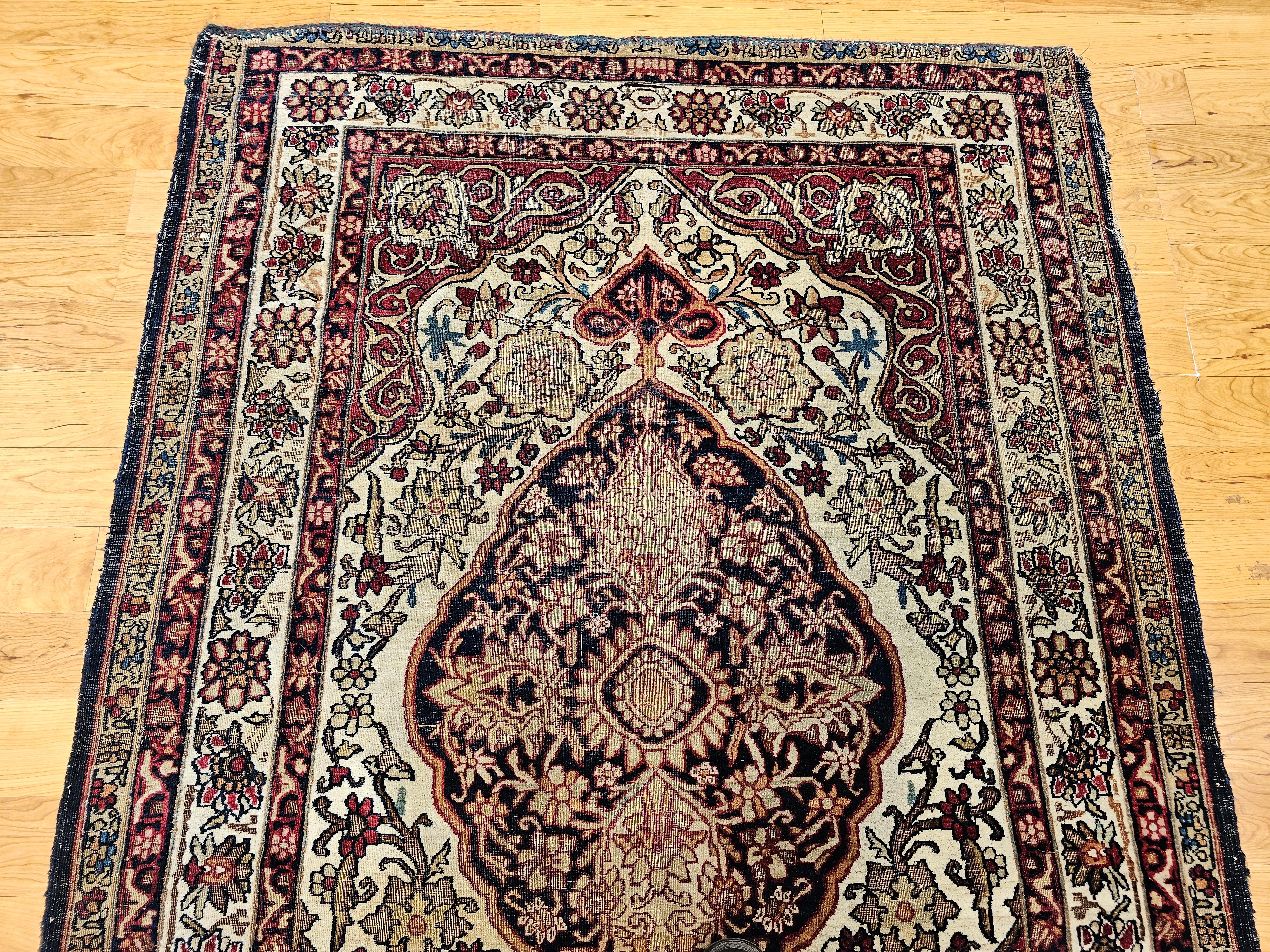 Perse Kerman Lavar du 19ème siècle à motif floral en ivoire, rouge, bleu marine, jaune en vente