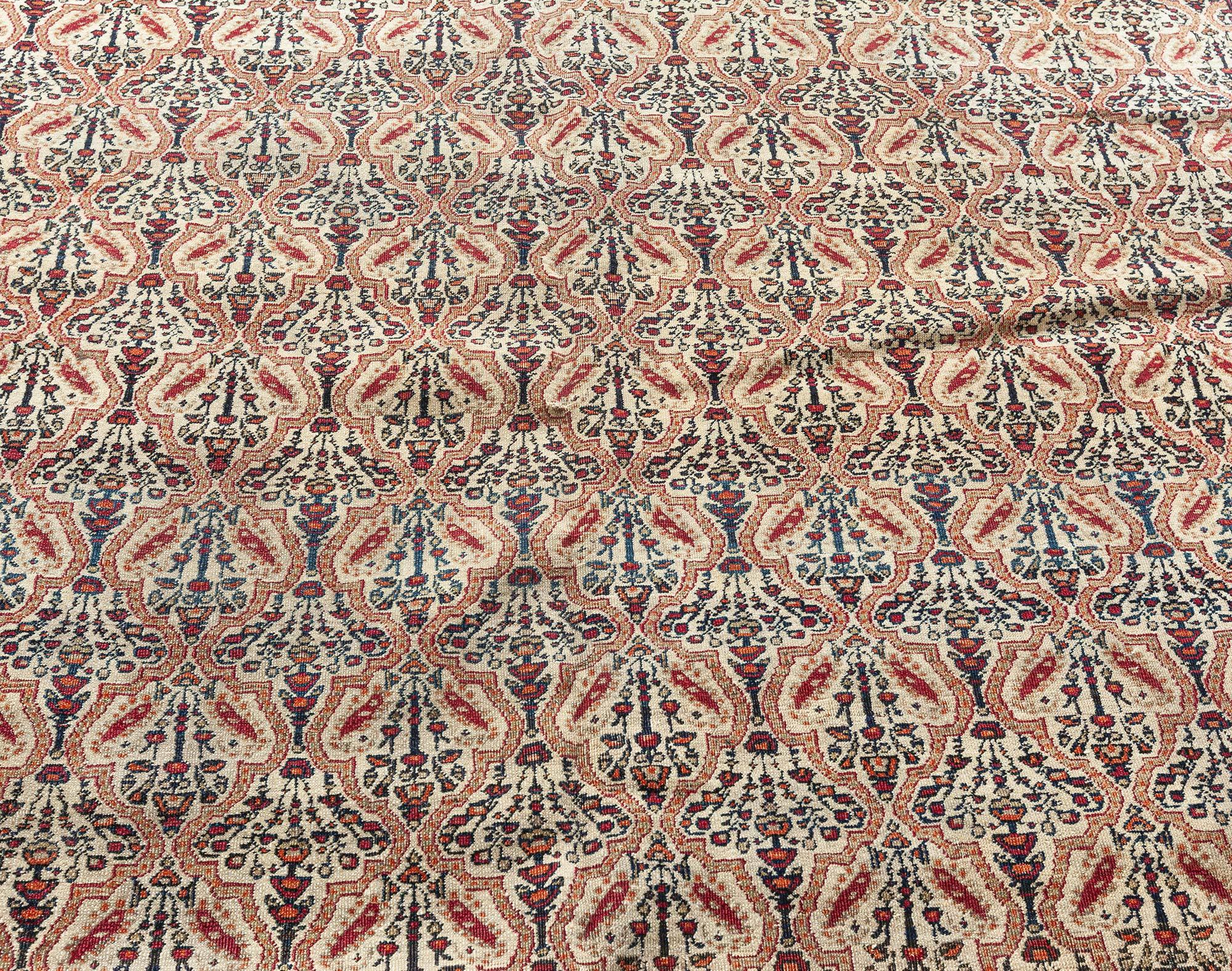 19th century Persian Kirman botanic red, green and beige handwoven wool rug
Size: 4'0