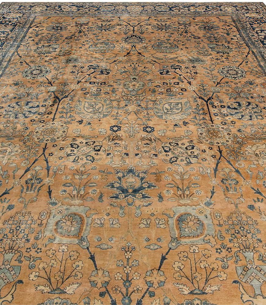 Authentic 19th century Persian Kirman handmade wool carpet
Size: 11'4