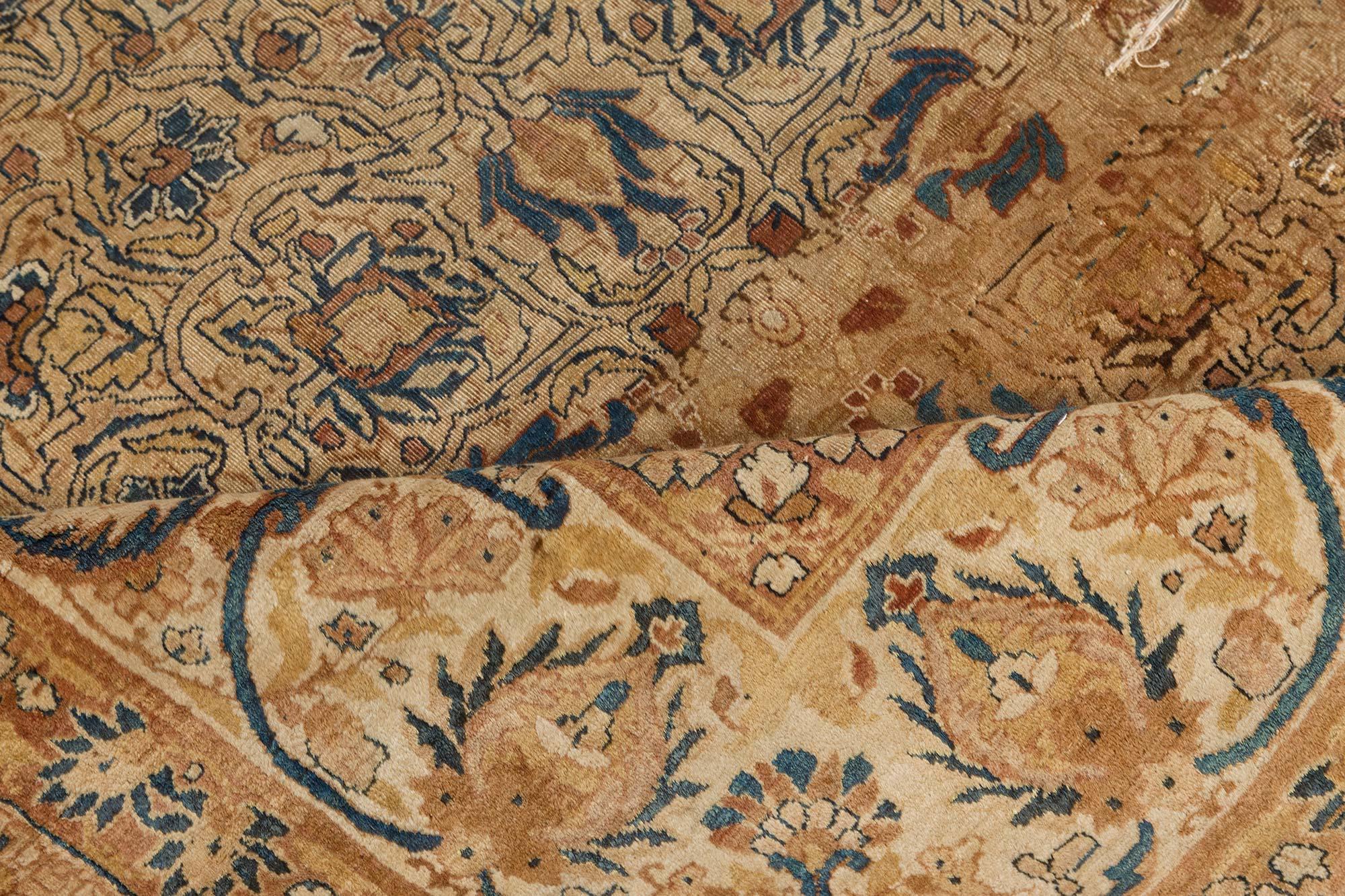 Authentic 19th century Persian Kirman handmade wool rug
Size: 10'9