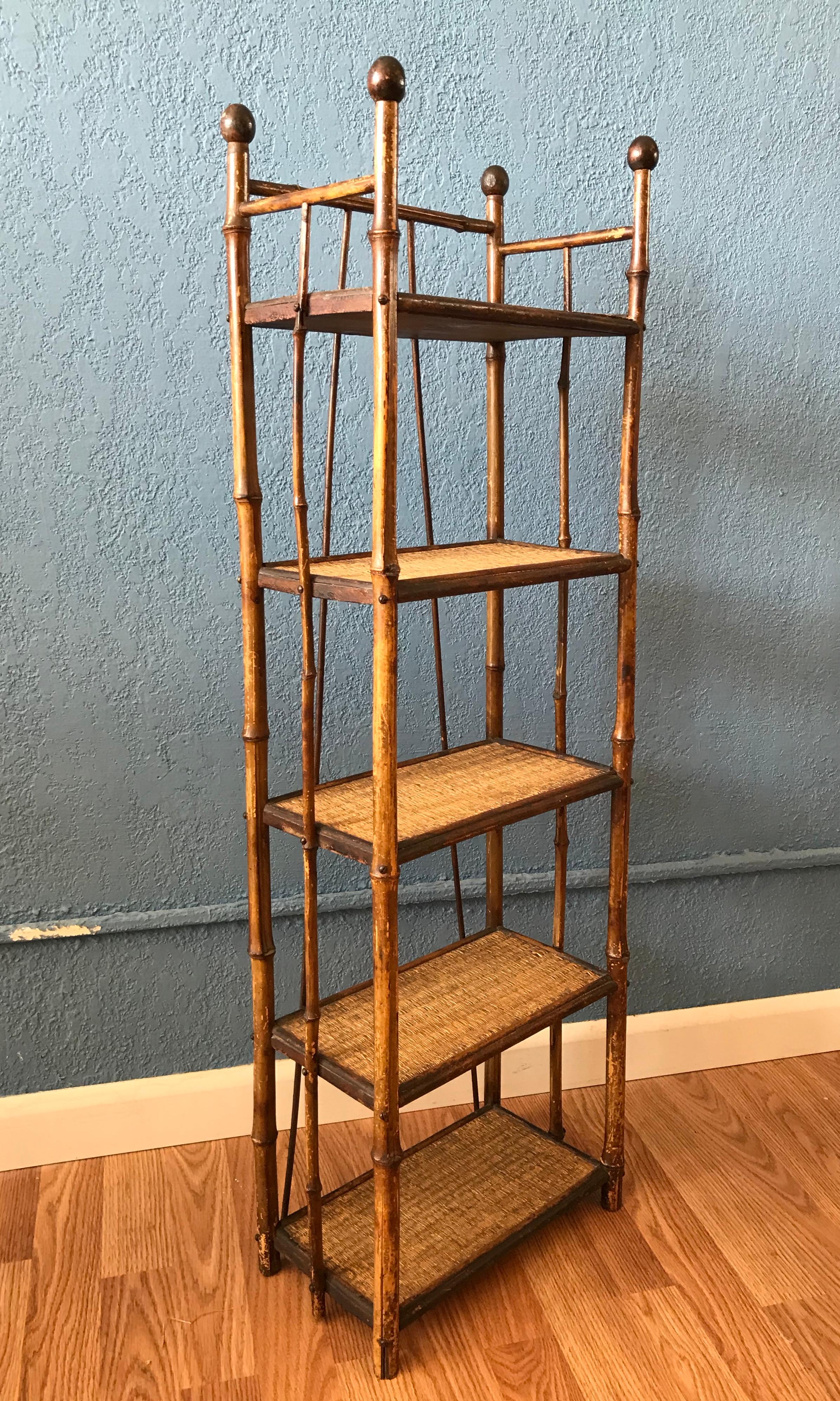 A very fine example - delicate, yet sturdy - the stand may also wall hung.
Unusual size and proportions. 5 shelves including bottom.