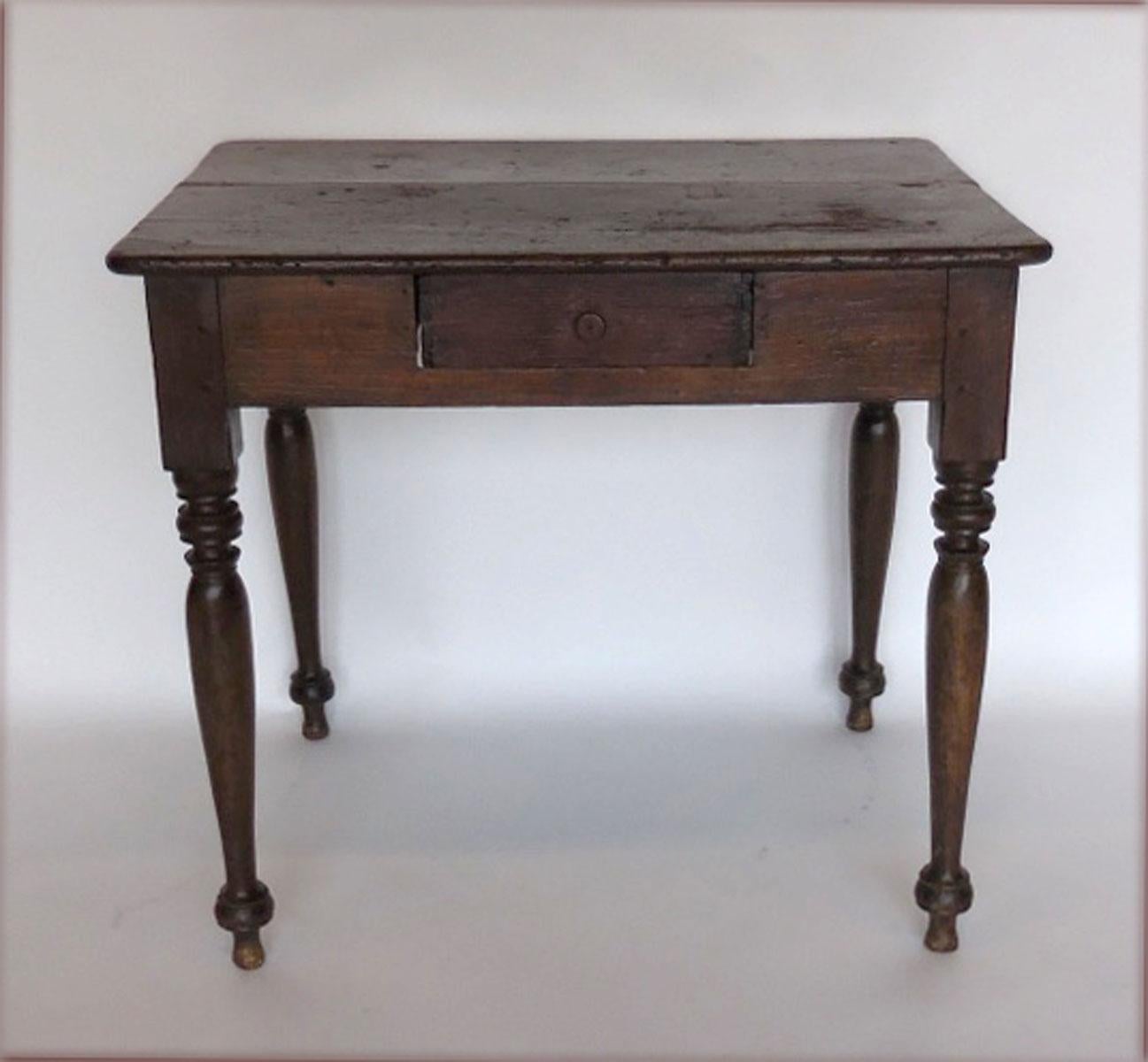 Cedro wood, 19th century small table with dovetailed drawer, all original with some repairs. Great old worn patina, nice long turned legs, two wide board top. Functional and great!