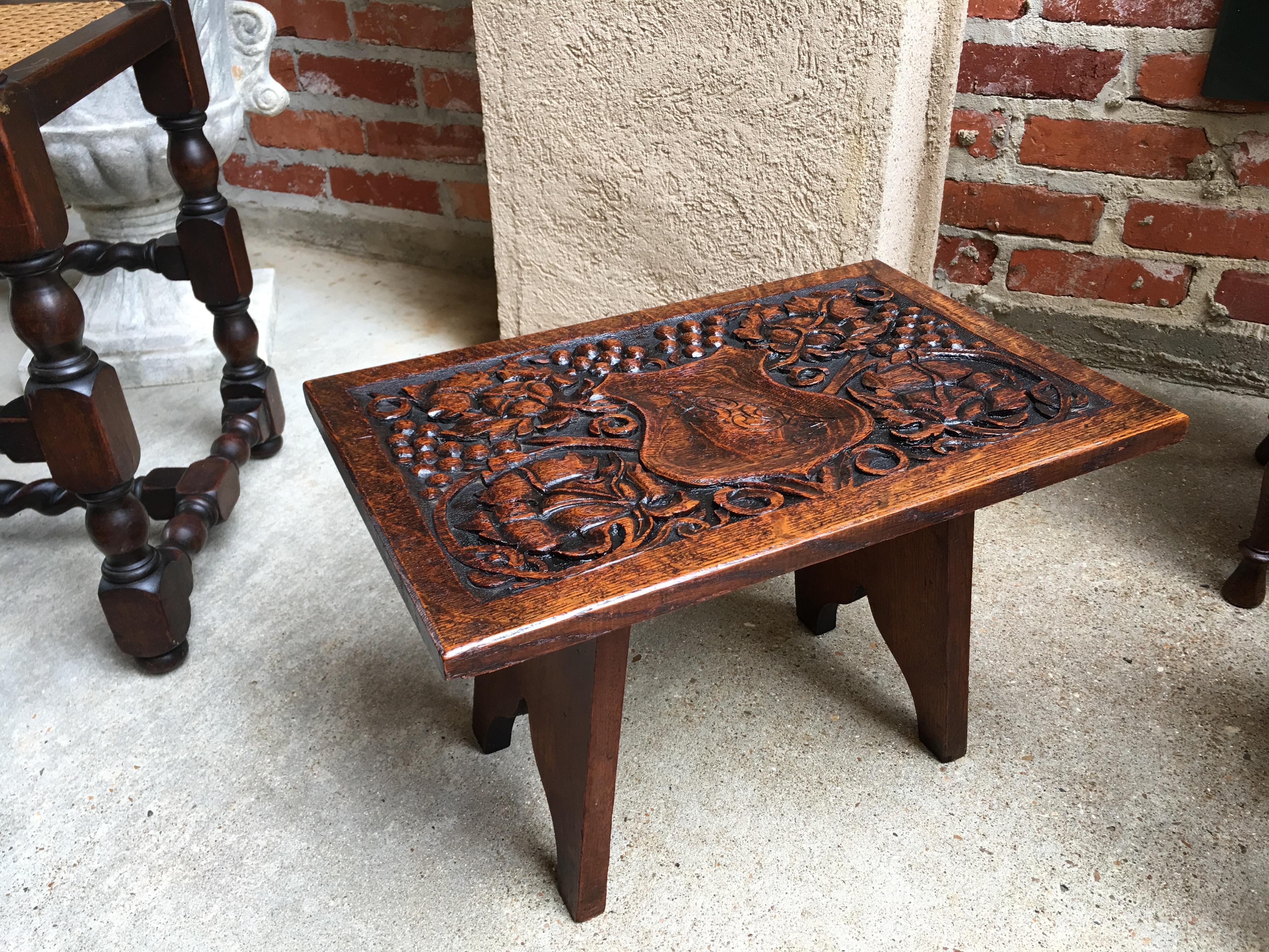 Direct from England, from the antique fairs near London, one of several outstanding small carved oak antique footstools/tables from our last buying trip. It is Such a Challenge to find the smaller accent pieces like this, we are very excited to have