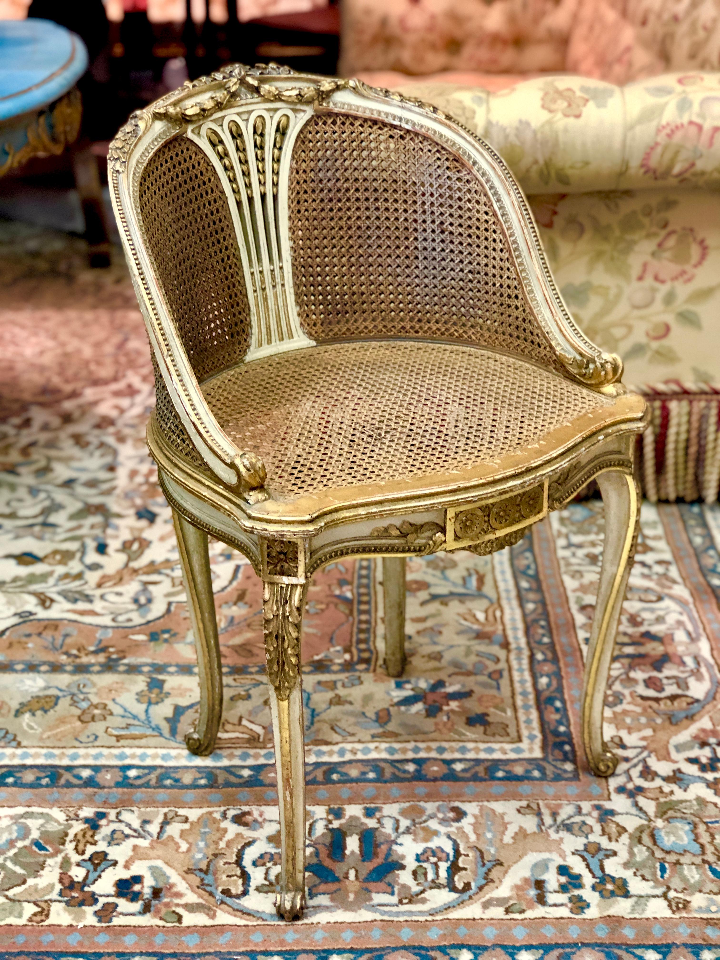 Petite French ballroom round chair, in Louis XVI style having a giltwood round hand carved frame with cane back and the seat. Very good condition.
France, circa 1870.
 