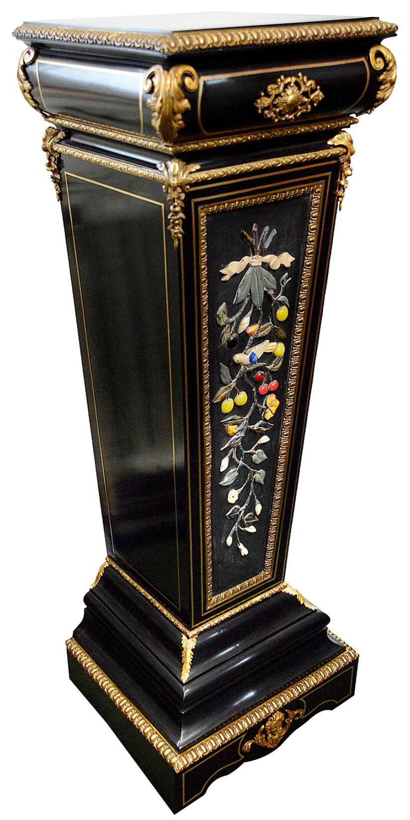 A very impressive and good quality 19th Century French ebonized Pietra dura inlaid pedestal with wonderful gilded ormolu scrolling foliate mounts, brass stringing. The central panel having carved precious stones depicting a ribbon above a branch