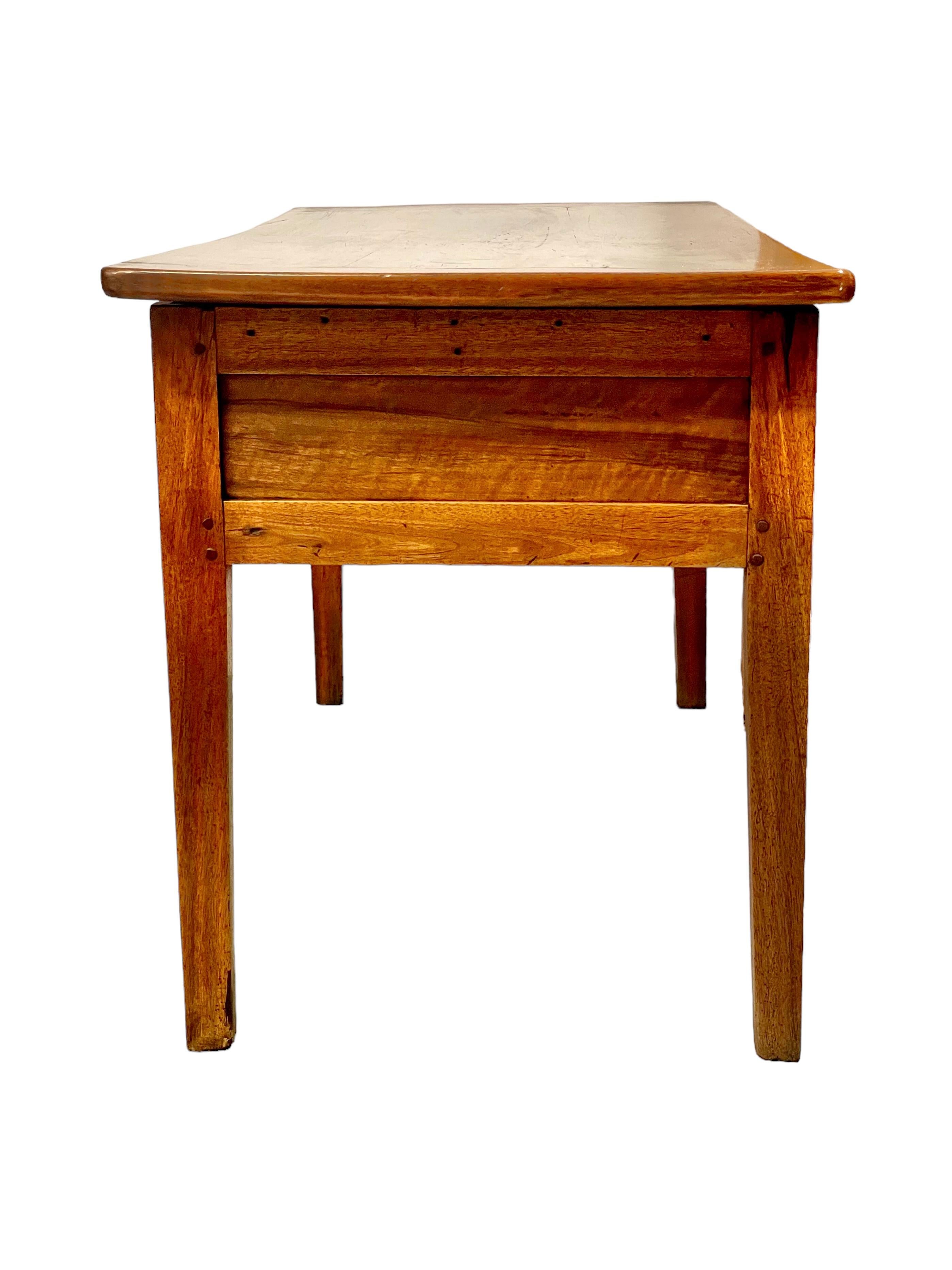 A rare French 19th century hand-crafted 'Pétrin' table with removable top, originally constructed for the purpose of kneading, proving and storing bread dough, and sometimes referred to as a 'dough bin' or 'trough'. Dough for bread and pastry was