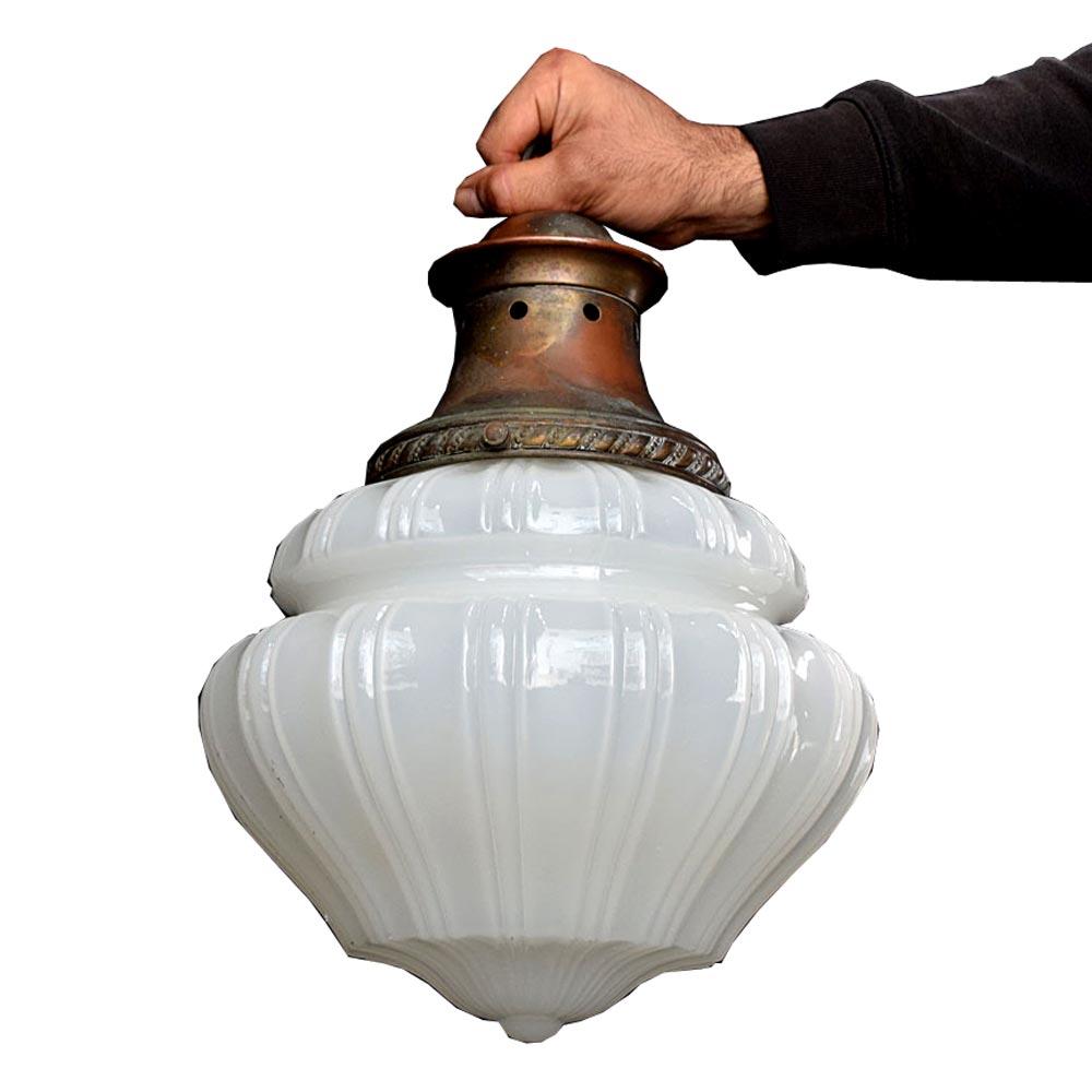 19th century pharmacy moonstone glass pendant light
We are proud to offer a mid-19th century English fluted opaque moonstone glass shade. Supported by its original copper gallery with a wonderful untouched patina. The moonstone shade boasts a