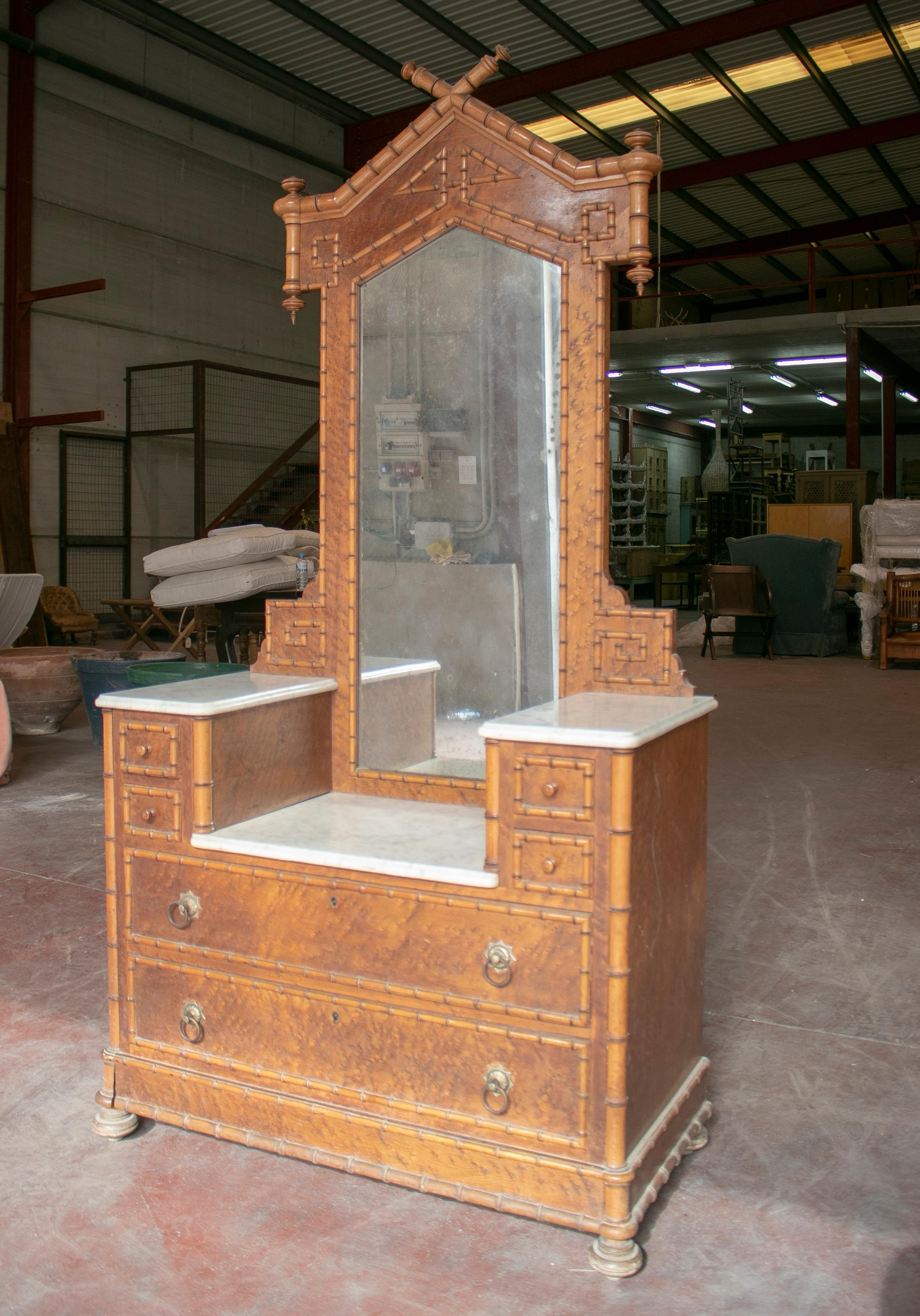 19th century Philippine bamboo, walnut and oak six-drawer dressing table with marble top.