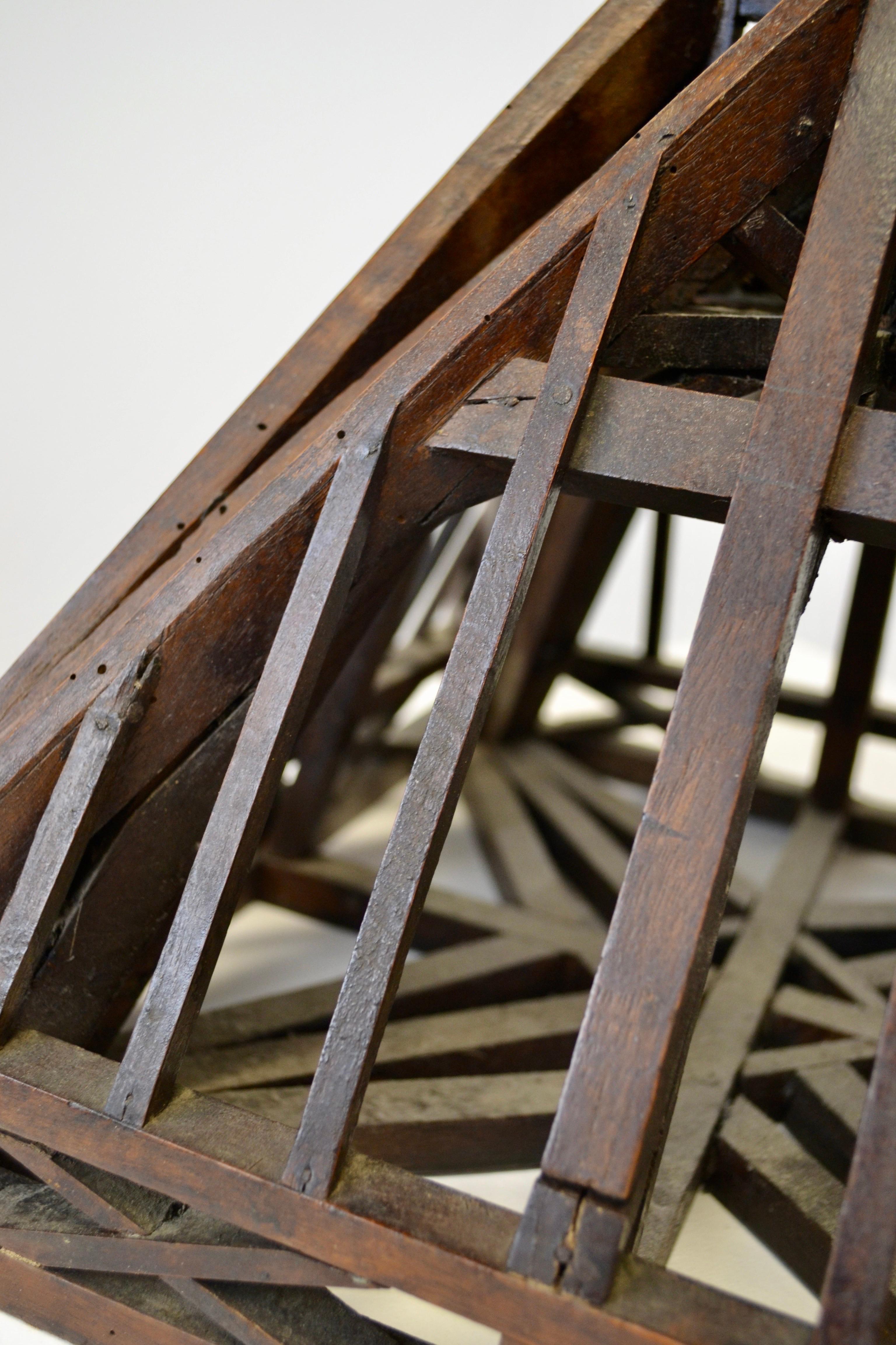 Architectural models like this one were crafted by apprentices or master artisans as part of their application for a title within their respective guilds. In France, these artisans were known as Compagnons du Devoir. Their training began with a long