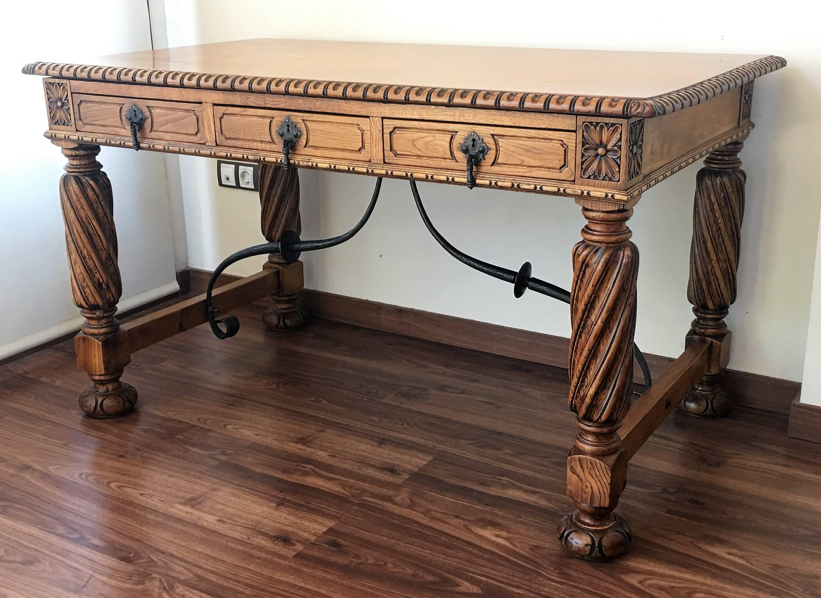 19th century pine and wrought iron desk with three drawers with turning legs
It is carved in back and front.
 