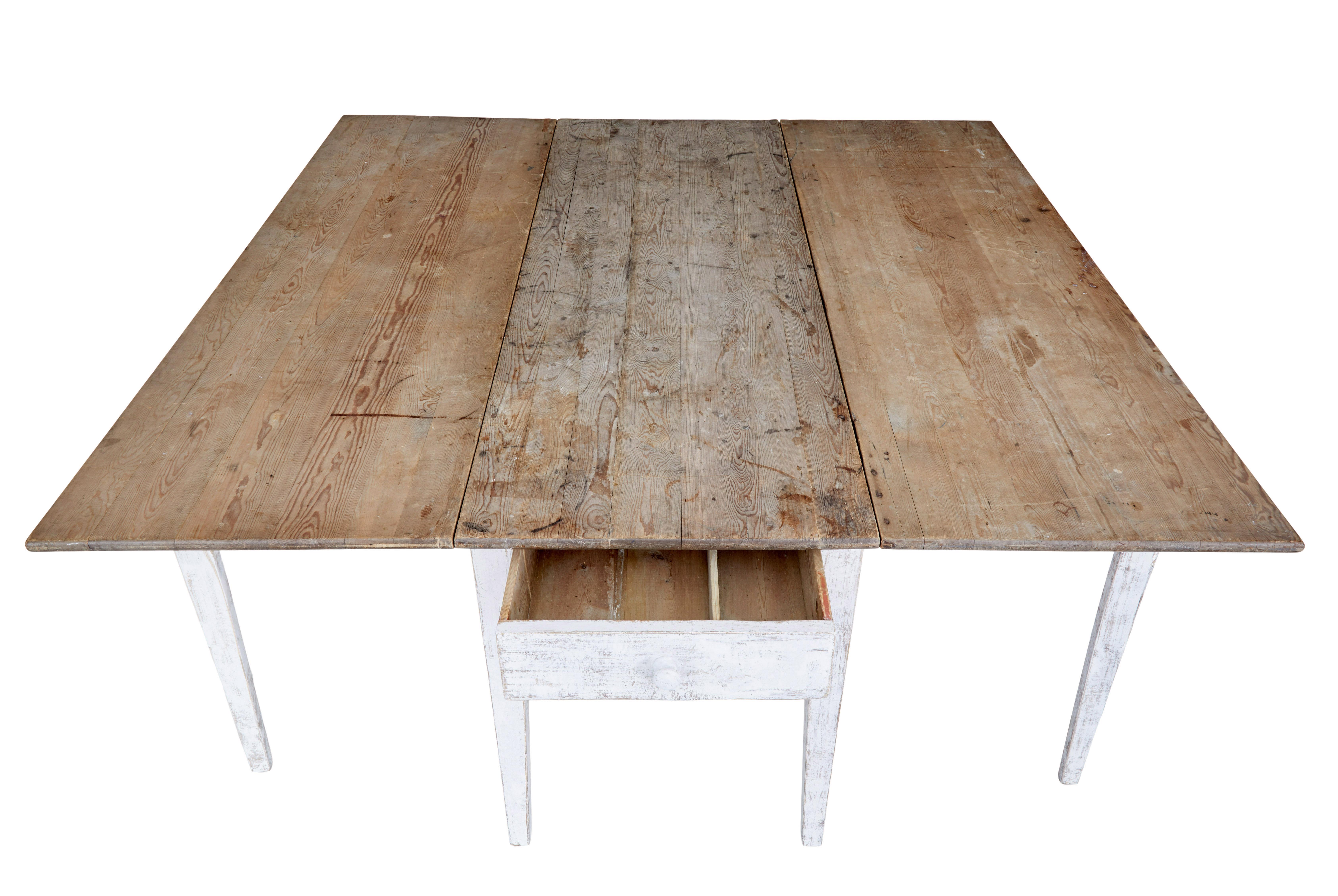 Pine 19th century pine drop leaf kitchen table of large proportions For Sale