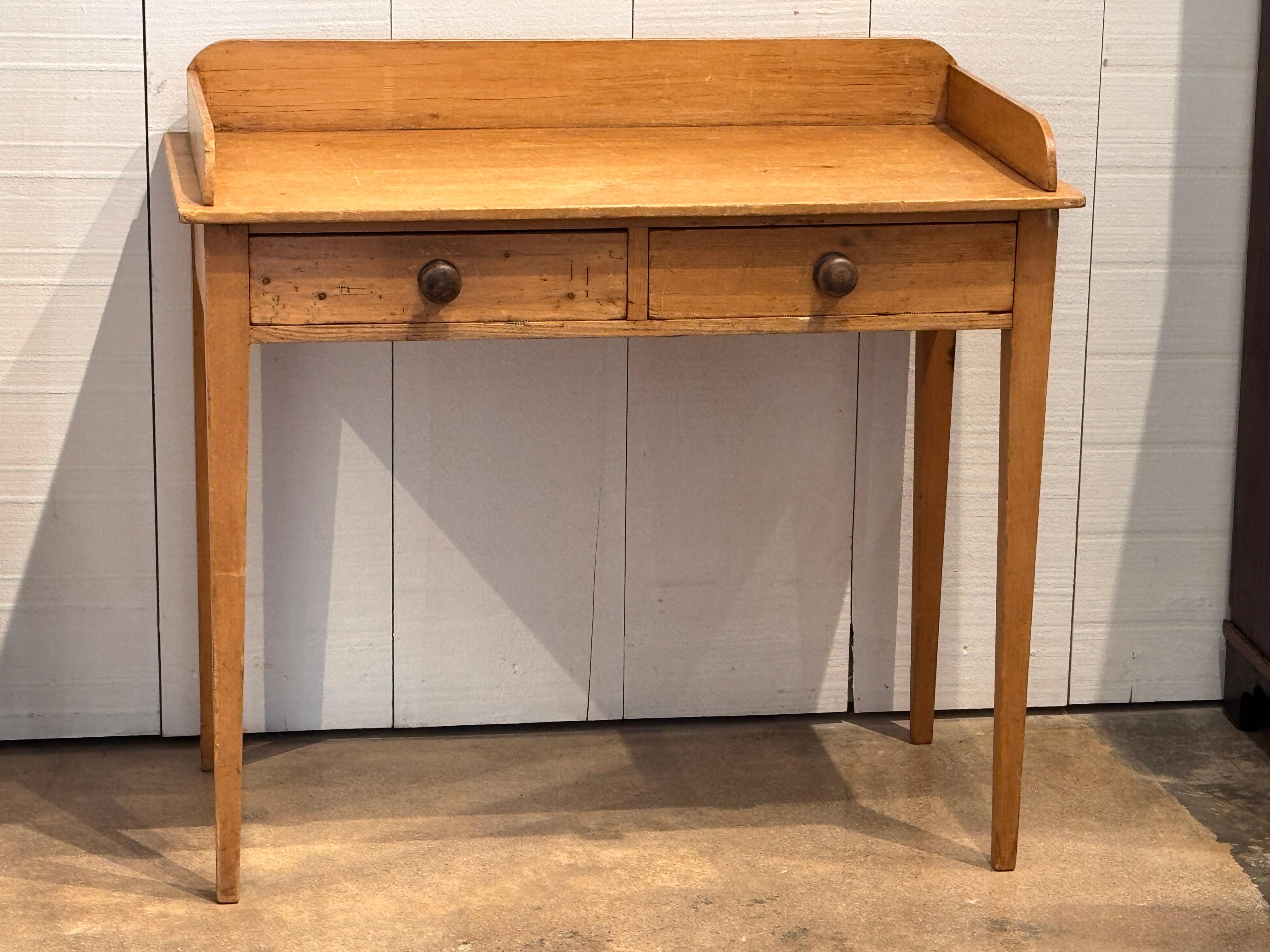 Français 19th Century Pine Table With Gallery Back and Two Drawers en vente