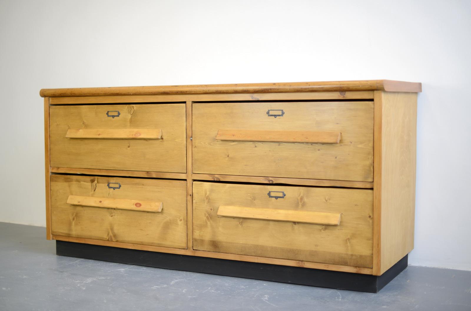 19th century pine tailors drawers

- 4 extra large drawers with original handles
- Copper card holders
- Dovetail jointed drawers
- Solid Pine top
- The cabinet originally came from a tailors in Cornwall where it was used to store rolls of
