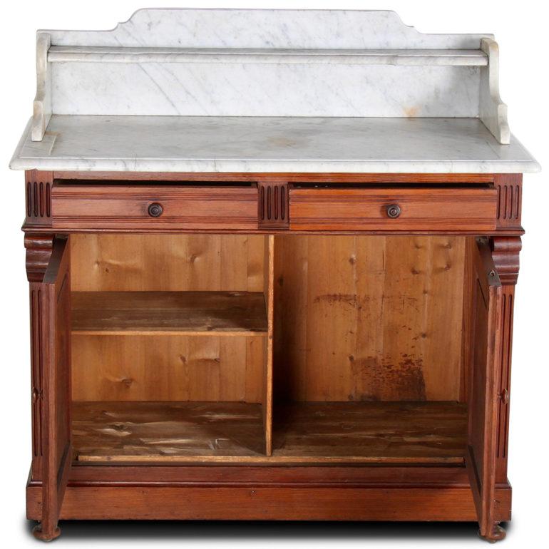 A French washstand in pitch pine with two drawers over two doors and a lovely Carrera marble top, circa 1890.



 