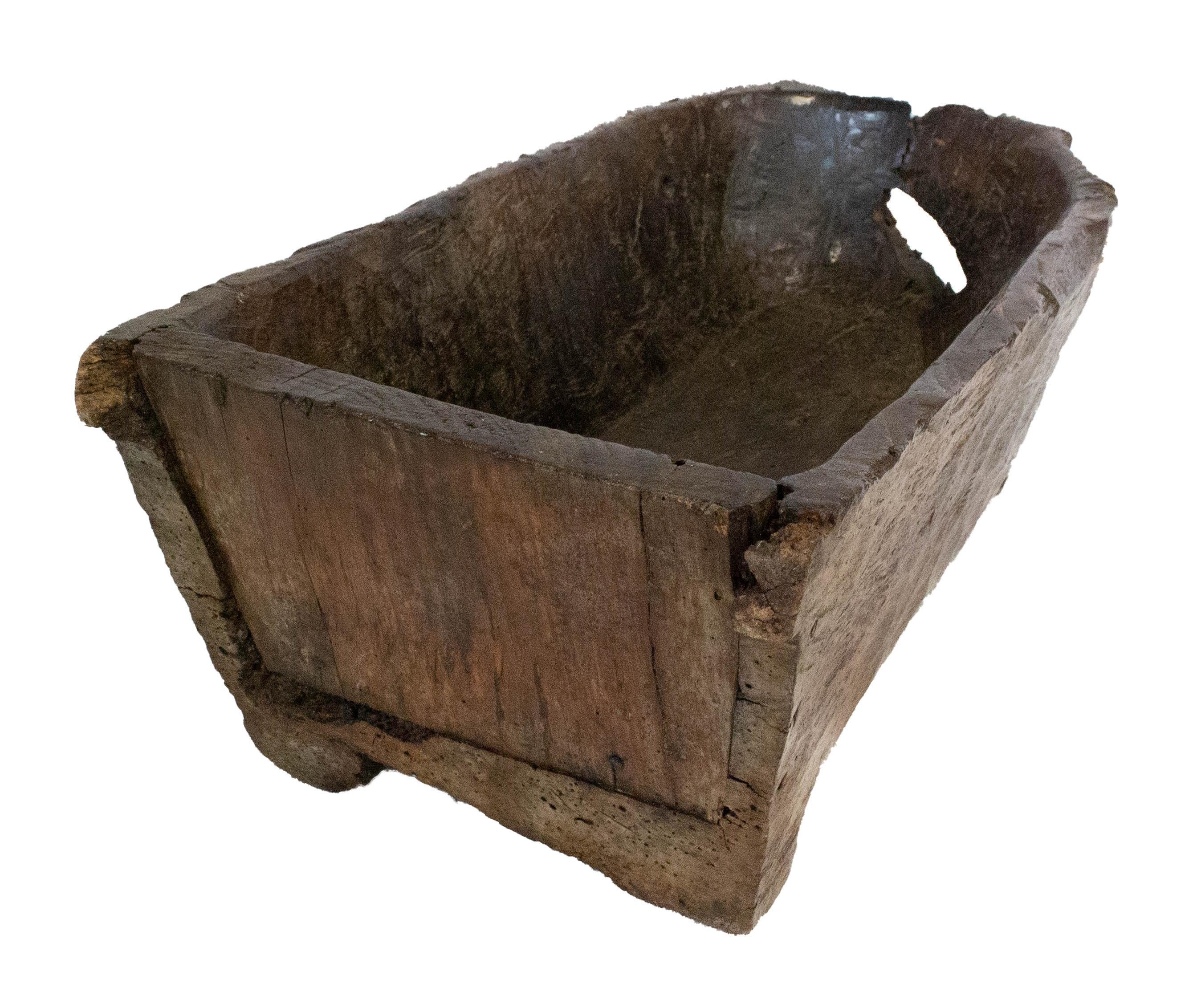 Antique French fountain basin can be used as a planter or jardinière
This item also may have served of children bath tub
Very old, the wood working technique suggests also the work of a clog maker
Lot of mystery for this old furniture witch can also