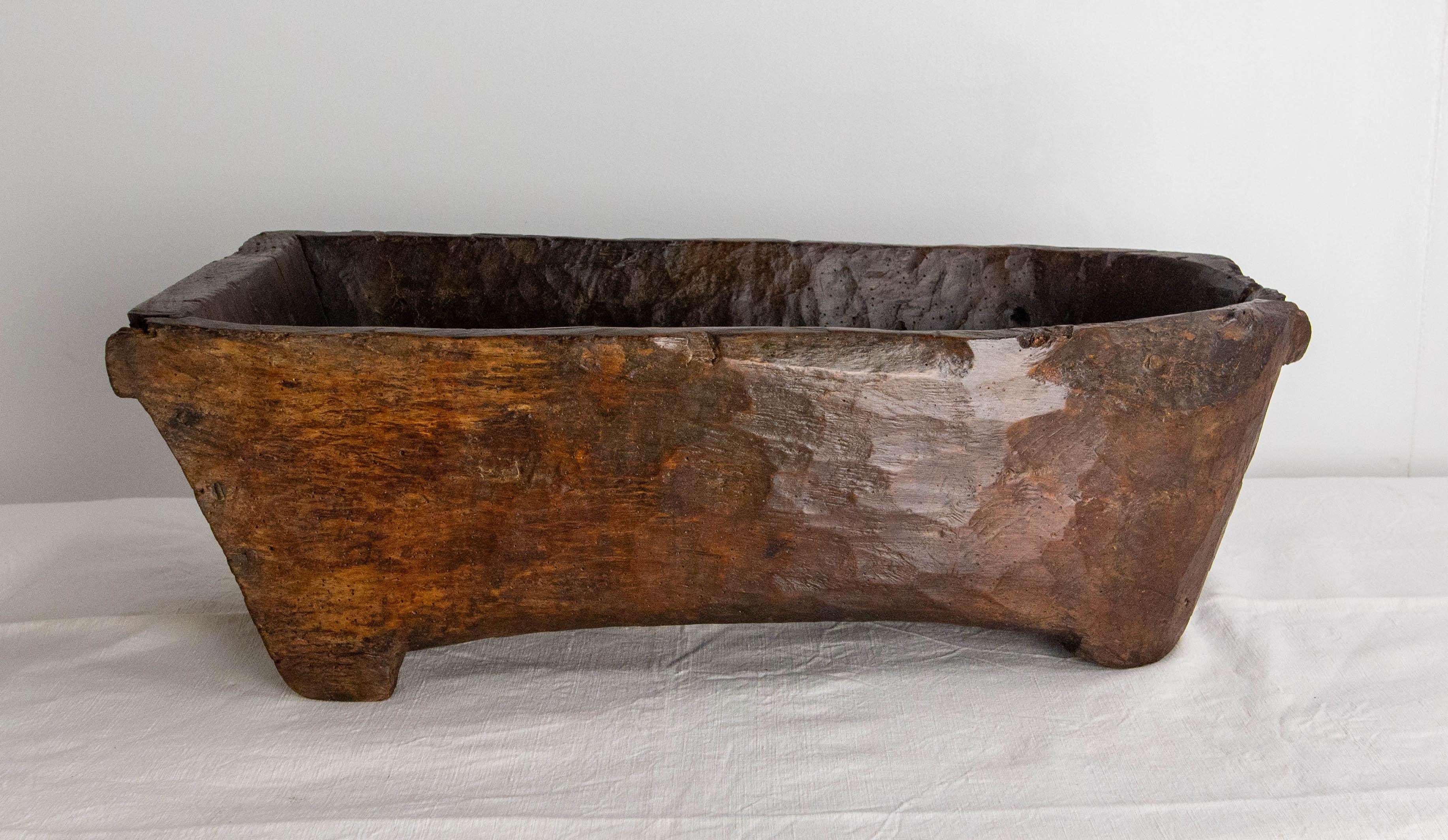 Antique French fountain basin can be used as a planter or jardinière
This item also may have served of children bath tub
Very old, the wood working technique suggests also the work of a clog maker using hand tools.
Lot of mystery for this old
