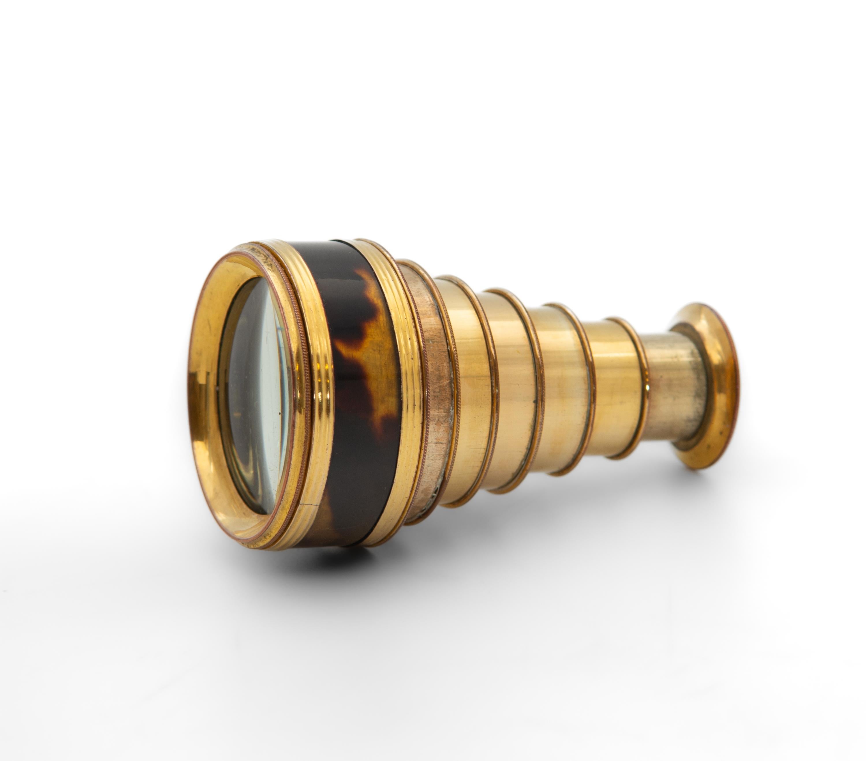 19th Century pocket telescope gilt brass and faux tortoiseshell spyglass, each friction fitting is tapering and collapsible with millegrain edges.

In good condition, showing some light signs of use. The light scratching to the glass and rubbing to