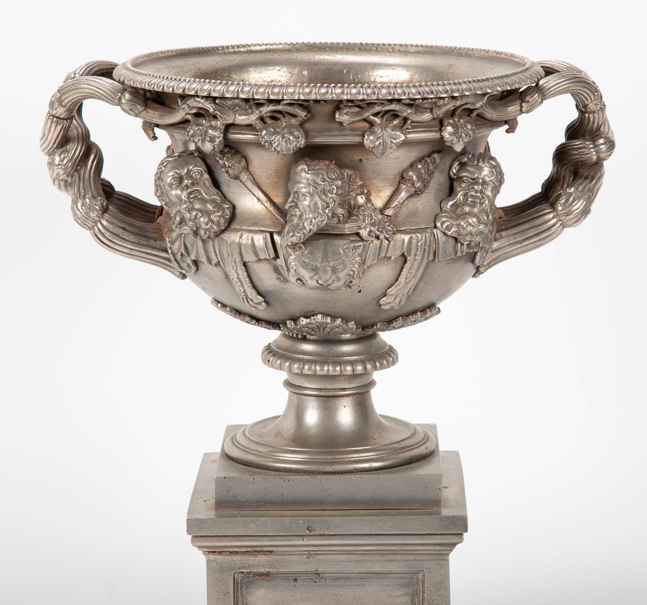 A fine and impressive example English Regency period Warwick Vase in polished steel. A handsome rendition of the famous Roman original. After it's excavation from Hadrian's Villa in the late 18th century it caused a sensation and copies were made in