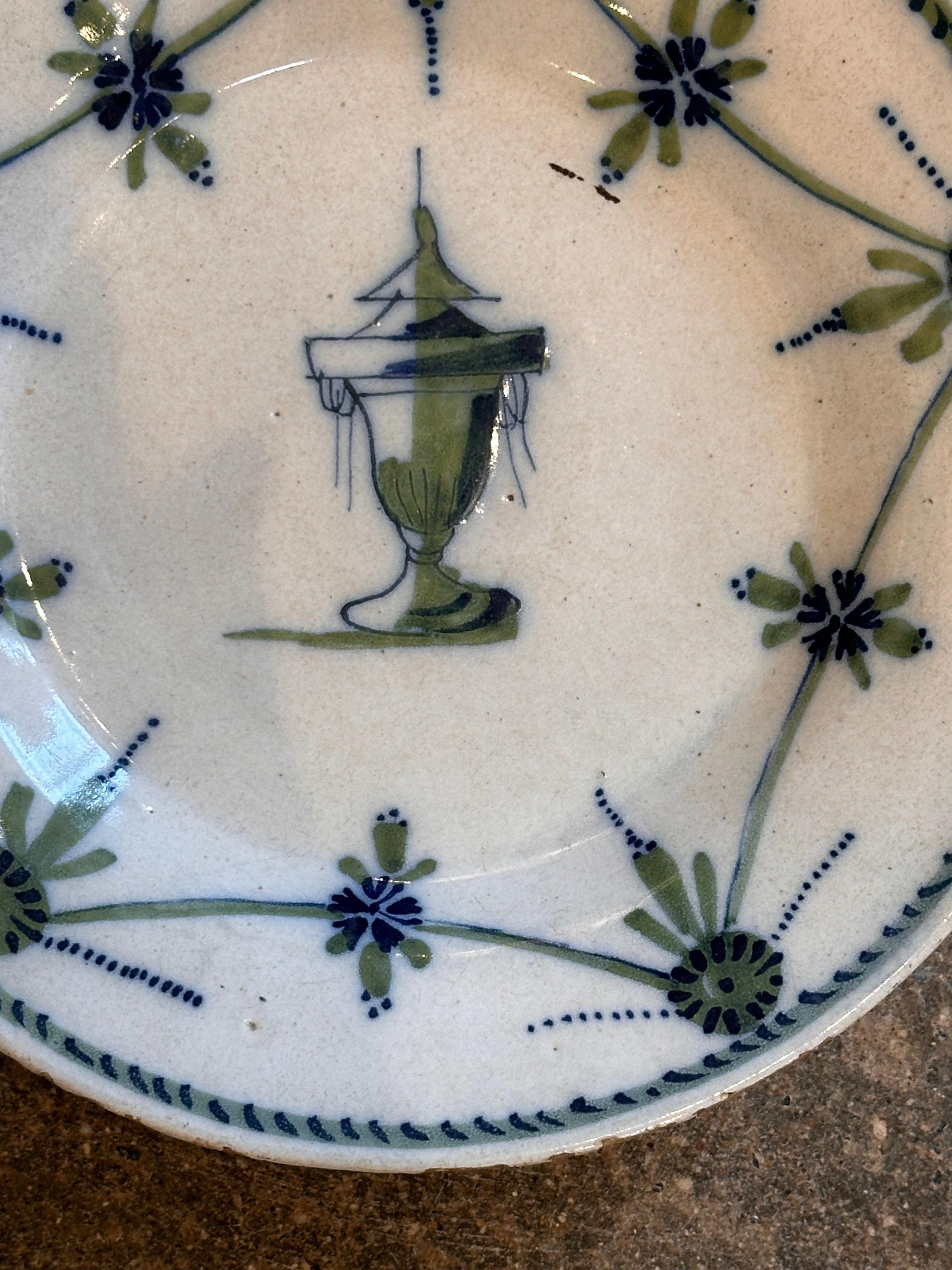 A unique color and design on this polychrome plate. Add to you collection.