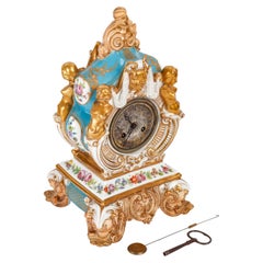 Horloge en porcelaine du XIXe siècle par Jacob Petit, période Napoléon III