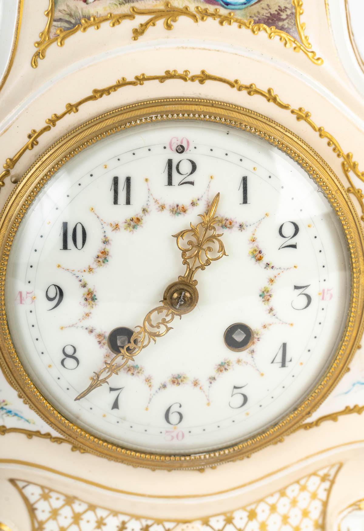 19th century porcelain clock, Napoleon III period.

Napoleon III period clock, 19th century, porcelain, enamelled dial.
H: 35cm, W: 23cm, D: 11cm