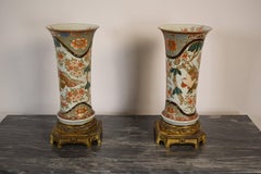 19th Century, Pair of Polychrome Imari Porcelain Vases on Gilt Bronze Bases.