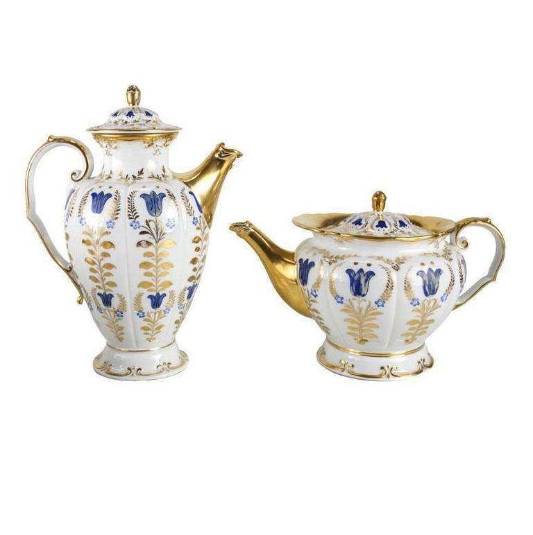 A fine mid-19th century porcelain tea and coffee service by Königliche Porzellan Manufaktur more commonly referred to as KPM. The matching service consists of a coffee pot, tea pot, open creamer, covered sugar and six cup and saucers. Each piece