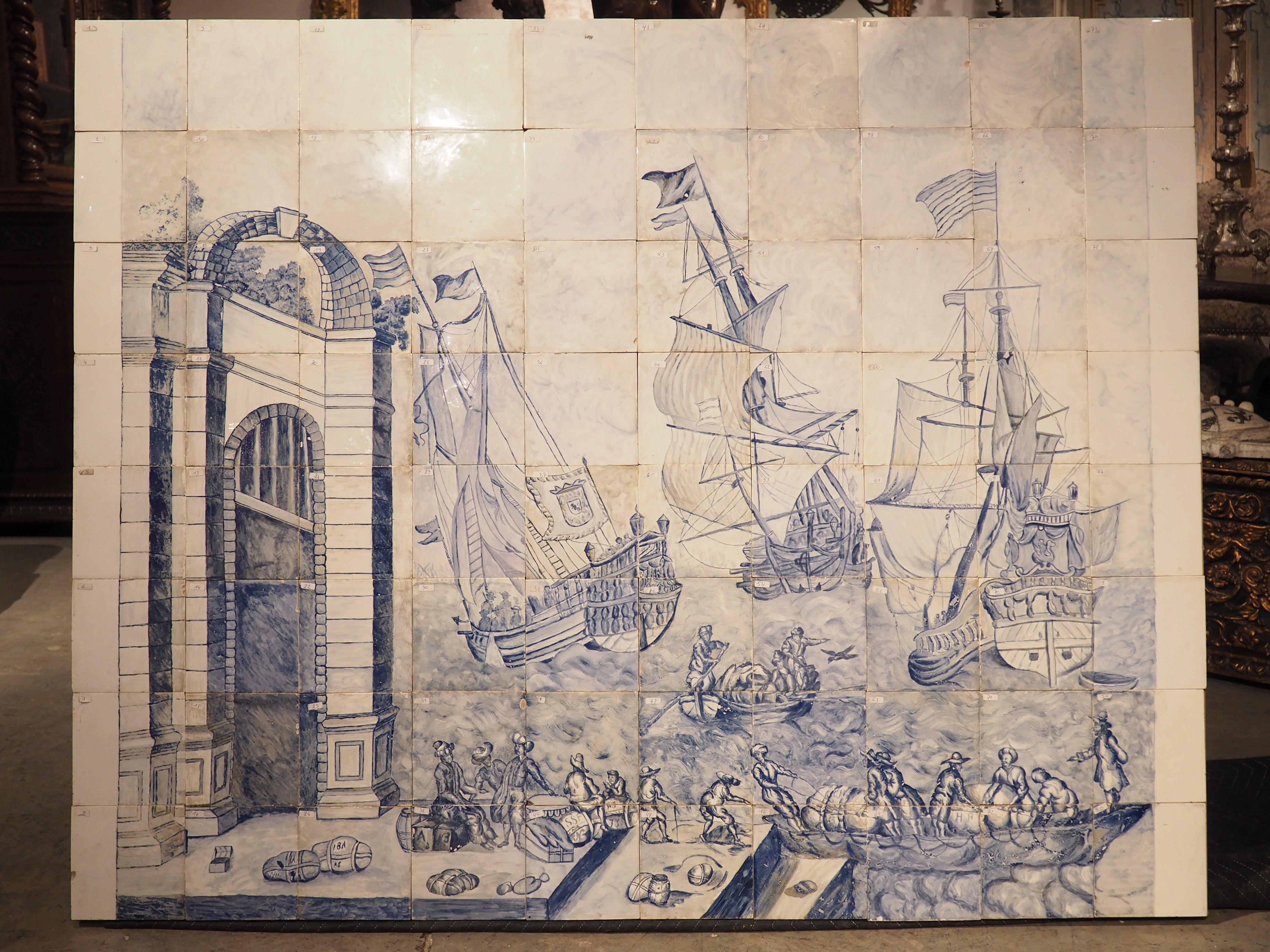 This beautiful blue and white panel consists of 80 individually hand-painted tiles from Portugal, and dates to the 1800s. Measuring nearly 4 feet tall and 5 feet wide, the scene depicted is that of a bustling port scene with ships, choppy waters,