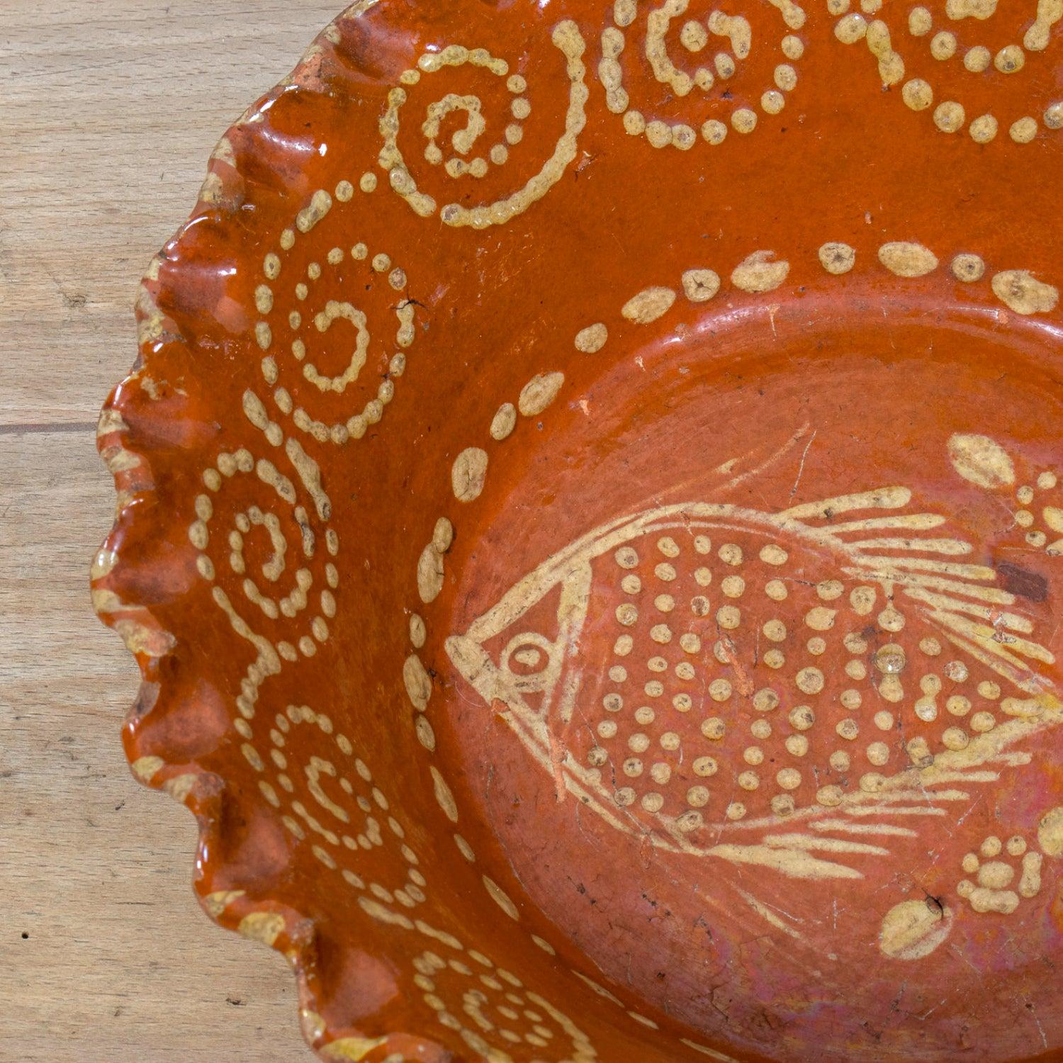 Terracotta 19th Century Portuguese Red Slipware Bowl with Fish Motif and Ruffled Rim For Sale