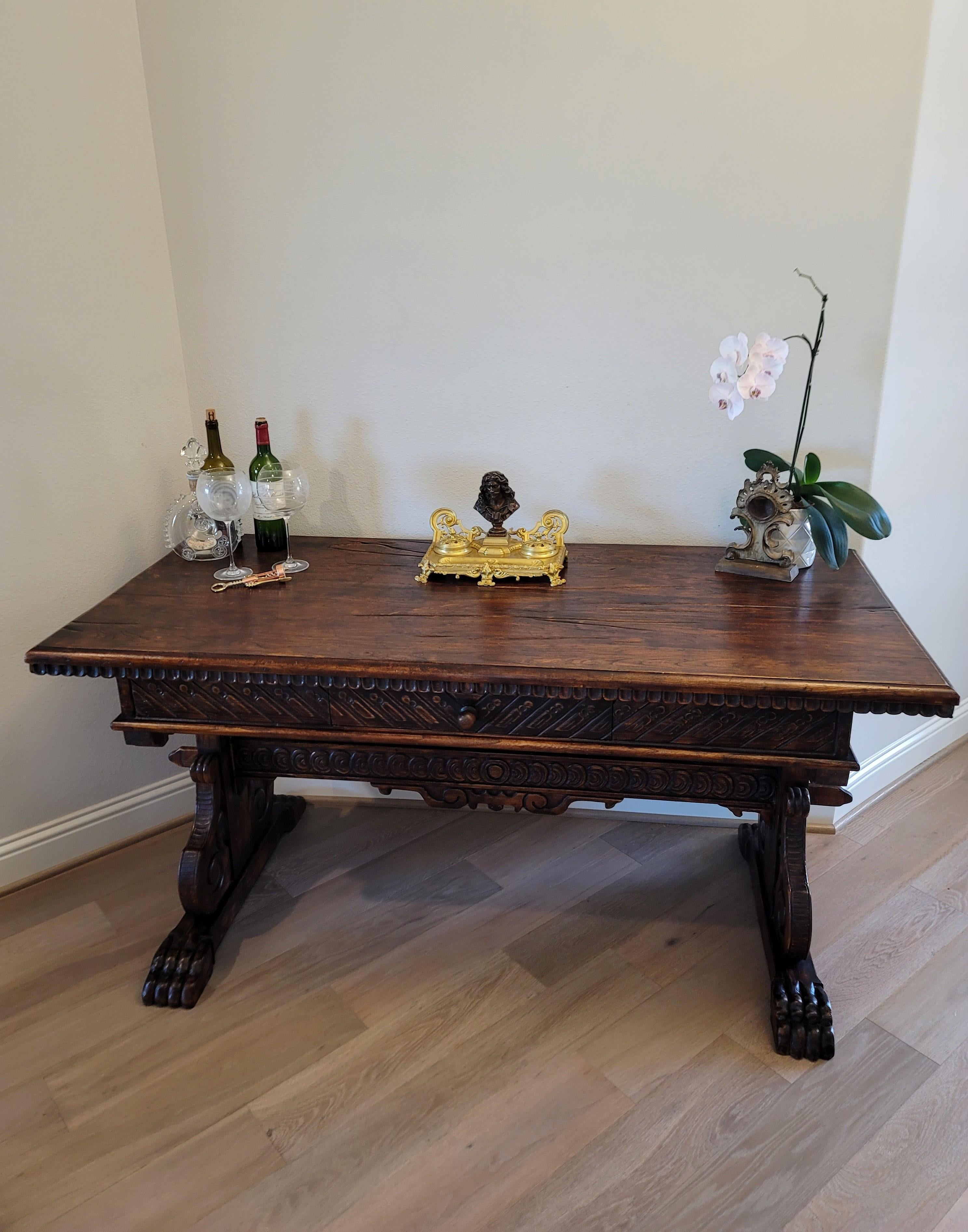 A most distinctive antique, circa 1870, Portuguese Renaissance Revival carved walnut trestle table with beautifully aged warm, rich dark patina!

Born in Portugal during the second half of the 19th century, featuring impressive Iberian peninsula