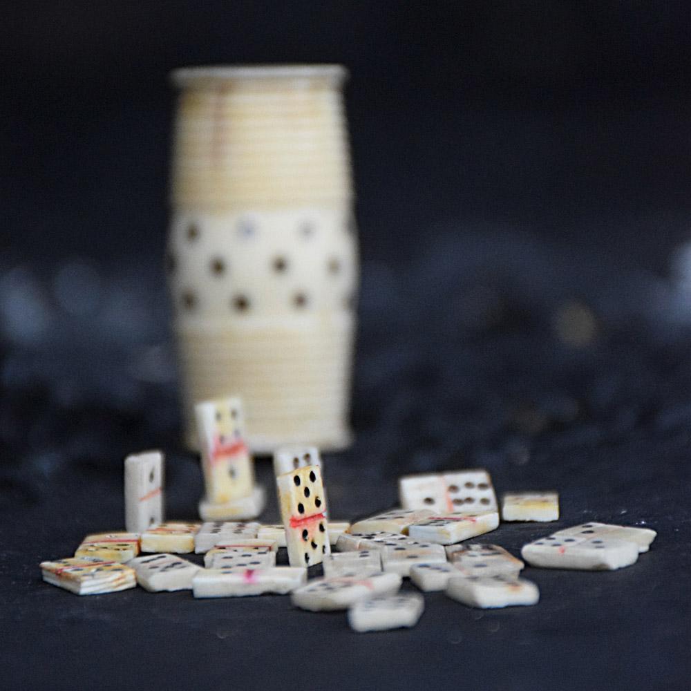 19th century POW Domino game
We are proud to offer a highly collectable and unusual example of a POW (Prisoner of War) mutton bone hand carved barrel box and miniature dominoes game. The lid unscrews away from the barrel, the mutton bone domino are