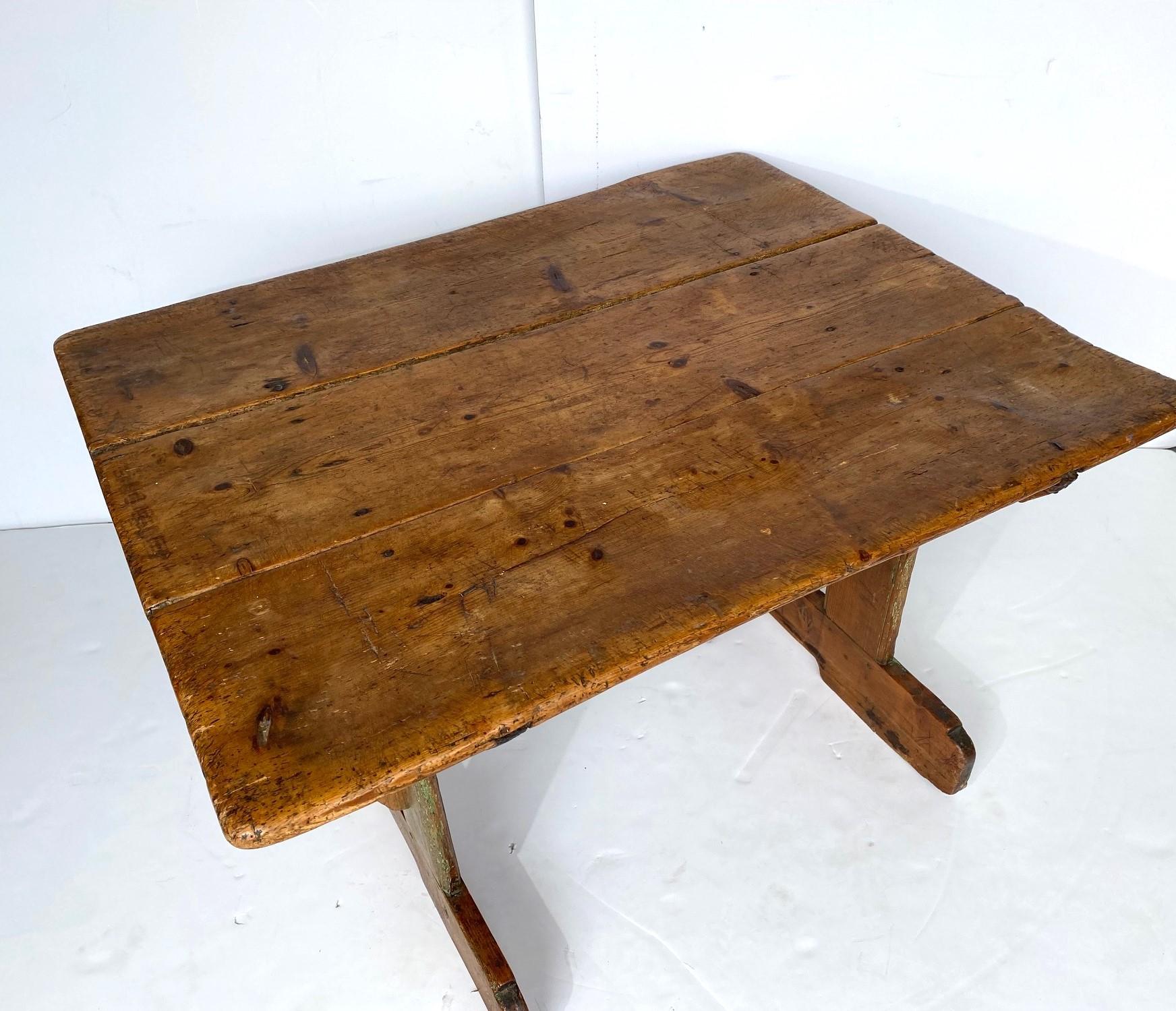 Primitive 19th-Century French pine accent table or coffee table.