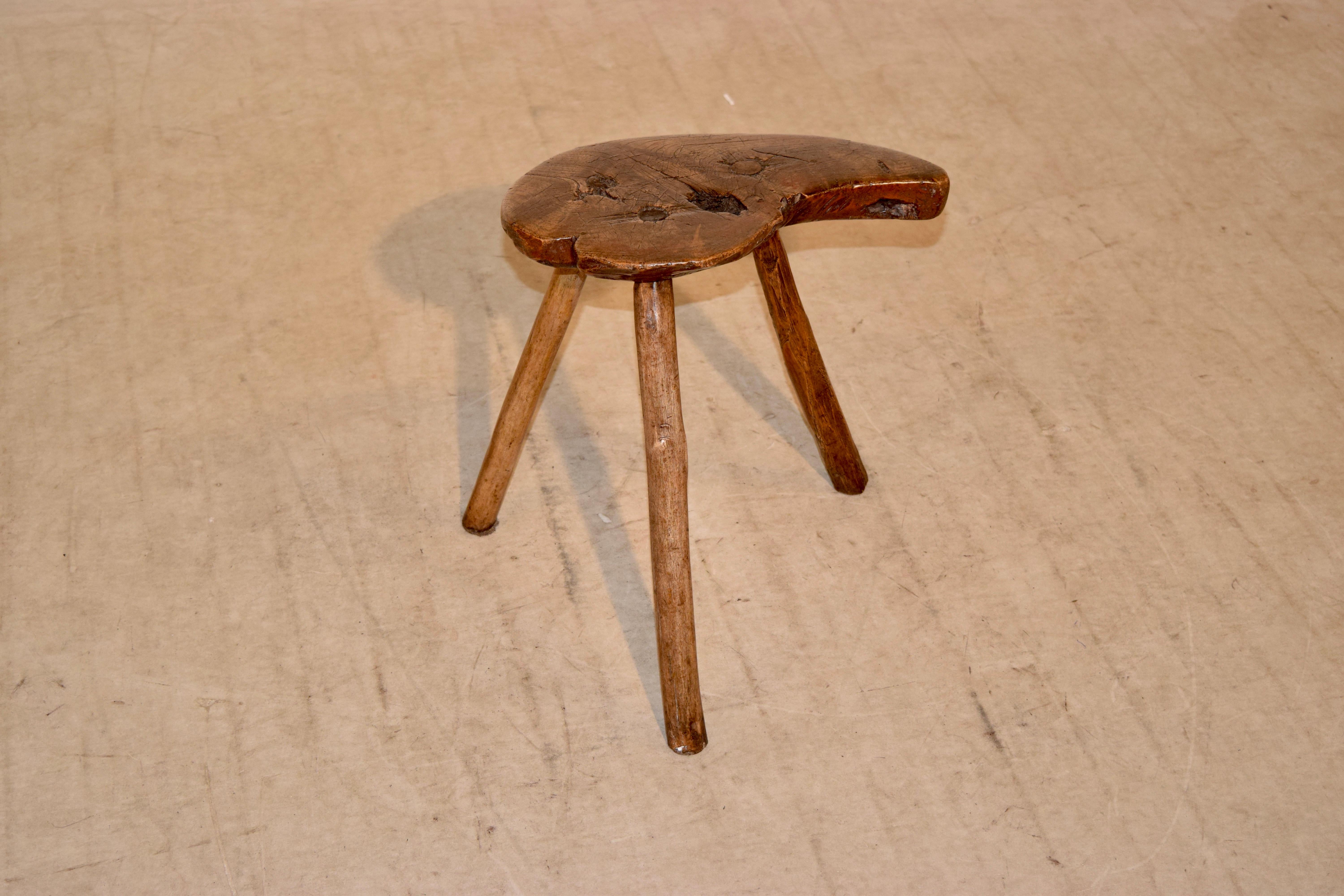 19th century American stool made from burl walnut and hickory. This stool is most likely Southern Americana and is a very rare find. The seat is heart shaped and is made form burl walnut, supported on splayed hickory legs.