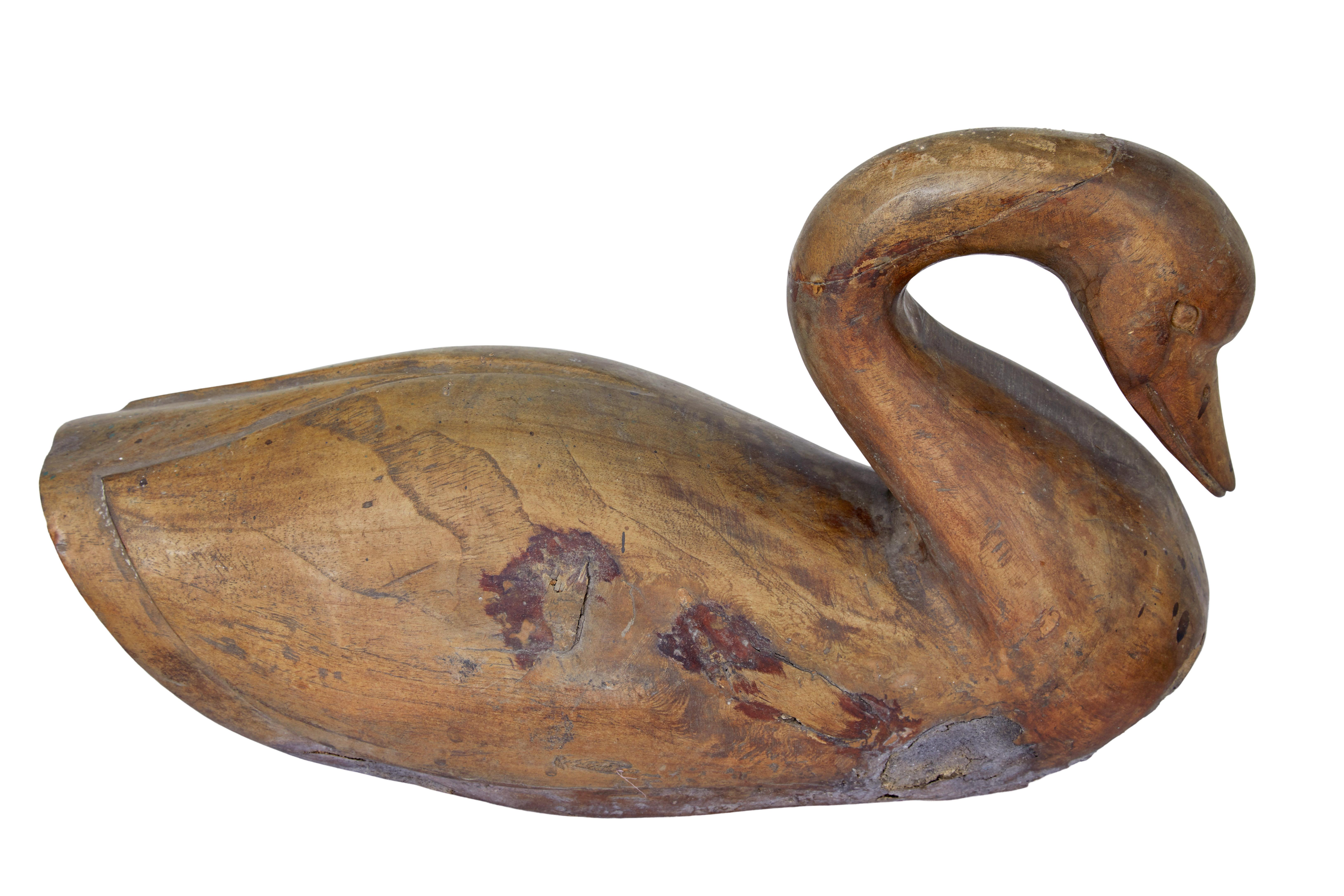 19th century primitive carved swan, circa 1870.

A rustic find on our recent travels to Sweden. Carved from a single piece of wood. Presented in its original found condition.

Areas of restoration, fill and staining.