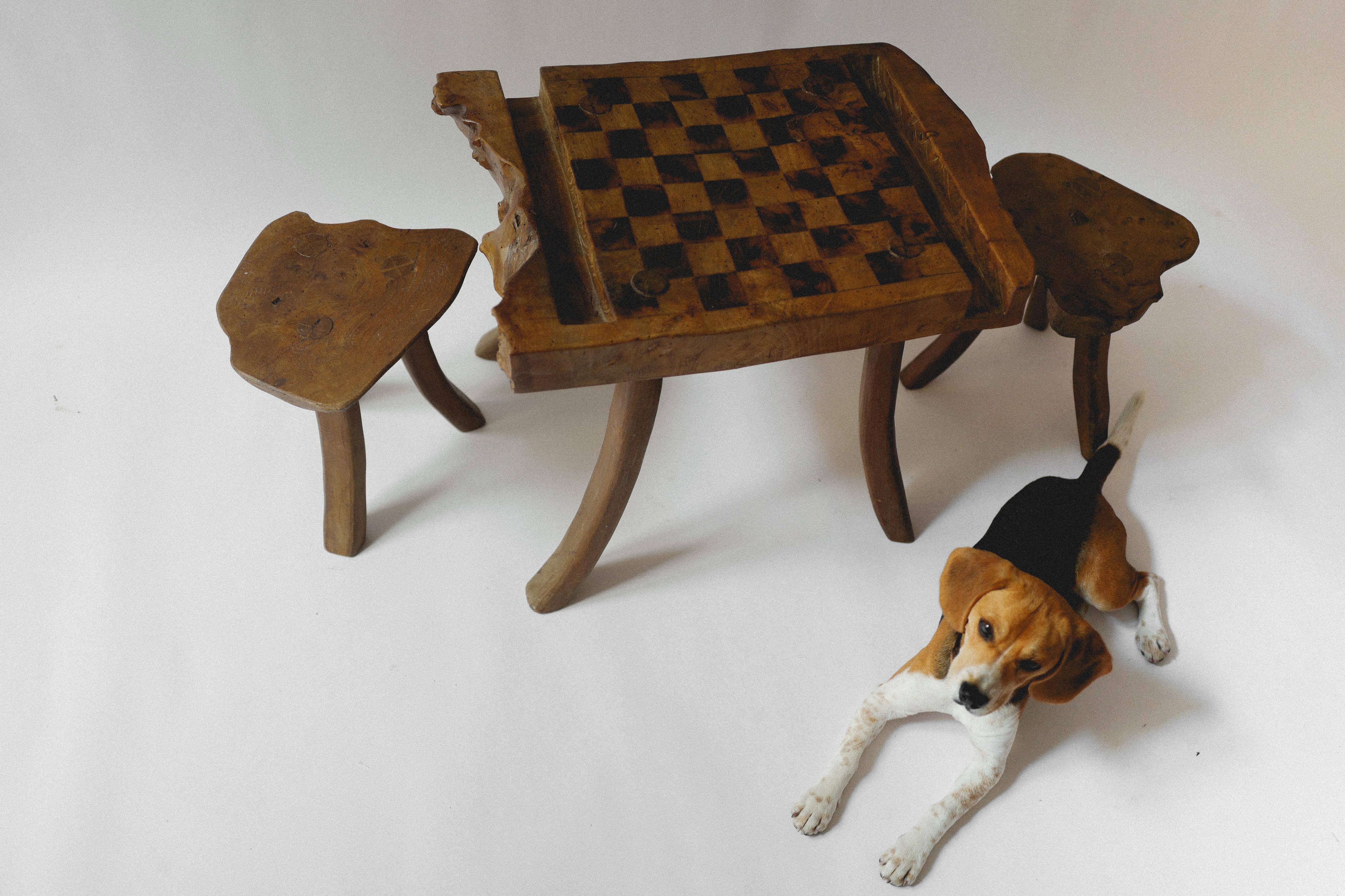19th century Primitive chess table set with lots of personality. Would work well in a hip hotel or a home game room to immediately add character. 

Stool Size: 12